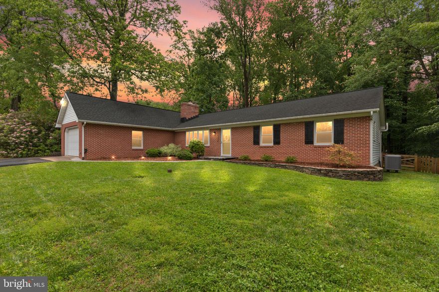 **OPEN HOUSE SATURDAY, MAY 31ST 11 AM - 1 PM**

Nestled on nearly half an acre in a quiet, non-HOA Bel Air neighborhood, this impeccably maintained 3-bedroom, 2-bath rancher with an oversized two-car garage offers true one-level living—bedrooms, baths, and laundry all on the main floor.

Step inside to a warm, inviting living room anchored by a 2019 wood-stove fireplace, where large windows frame peaceful views of the front yard and cul-de-sac. A ceiling fan with light and rich, gleaming hardwood floors (refinished in 2023) flow seamlessly throughout the main living areas. The living room opens to the dining area and a spectacular 2021 screened-in porch—built with low-maintenance composite materials—which seamlessly combines indoor and outdoor entertaining spaces.

At the heart of the home, the 2018 kitchen renovation showcases quartz countertops, quarter-sawn oak slow-close cabinetry, recessed and pendant lighting, and high-end appliances. Tucked just off the kitchen, the former mudroom was transformed in 2020 into a flexible office-laundry room with luxury vinyl plank flooring—perfect for remote work, crafting, or school projects.

Each of the three generous bedrooms is appointed with its own ceiling fan, light, and ample closet storage. The primary bath received a stylish makeover in 2022, and the hall bath was completely reimagined in 2024 with tile floors and decorative lighting.

Downstairs, the full basement boasts a large rec room with overhead lighting, a dedicated storage room with built-in wooden shelving, and a spacious workshop with its own exterior walk-out door. Outside, a wide parking pad accommodates your RV, boat, or extra vehicles—no HOA means no restrictions on your toys.

Major system updates ensure worry-free ownership: roof replaced in 2019, furnace in 2018, water heater in 2016, and both a new front walkway and driveway coating in 2023. A fully fenced backyard with a paver patio (2021) and abundant storage throughout make this rancher truly move-in ready—combining comfort, style, and convenience in one of Bel Air’s most desirable locales.
