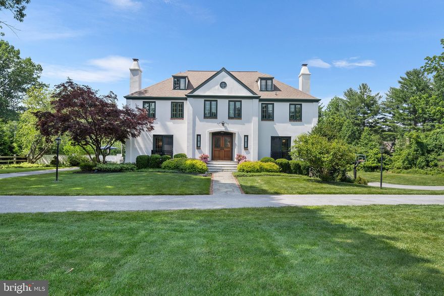 Welcome to 1263 Argyle Road, Berwyn, PA - A property like this is rarely offered!
Set at the end of a no through street in one of Berwyn’s most desirable neighborhoods, this gorgeous French Colonial is a rare find. With incredible curb appeal, an oversized driveway, and 2 pristine, manicured acres bordered by woods, this home offers privacy, beauty, and space to enjoy both inside and out. The neighborhood is perfect for walking, bike riding, and enjoying the peaceful surroundings—all within the award-winning Tredyffrin-Easttown School District.
The outdoor living space is an entertainer’s dream, featuring an in-ground pool, putting green, extensive hardscaping with multiple patios, a built-in fire pit, and plenty of yard left to relax, garden, or play.
Inside, the home boasts a bright, open floor plan with two large gathering rooms, a renovated chef’s kitchen outfitted with Viking and Sub-Zero appliances, a formal dining room, and a versatile first-floor office or in-law/au pair suite with full bath. Upstairs you'll find four bedrooms, three full baths and a laundry room equipped with cabinets for additional storage.  The spacious primary suite is adjoined by a large, light filled bathroom and custom oversized walk-in closet. 
A staircase leads from the second level to the unfinished third level offers over 500 sq ft of flexible potential—ideal for an additional bedroom, playroom, or home office. The walk-out lower level is designed for fun and function, with a sitting area and bar that open to a new flagstone patio with steps leading to the pool. Two more large rooms on this level provide additional space for recreation or relaxation.
Upgraded and meticulously maintained, this home has undergone many improvements throughout the current ownership. Enjoy a beautifully renovated kitchen featuring modern finishes, as well as significant hardscape additions that elevate the outdoor living space. Updates also include new electrical and lighting systems, upgraded HVAC, fresh interior paint, a new pool filter and heating system as well enhanced landscaping for added privacy and curb appeal.  Additionally,  the home also features a whole-house generator for uninterrupted power and peace of mind.
This is a rare opportunity to own a move-in-ready home that combines luxury, function, and lifestyle—all in one of the Main Line’s most sought-after locations!