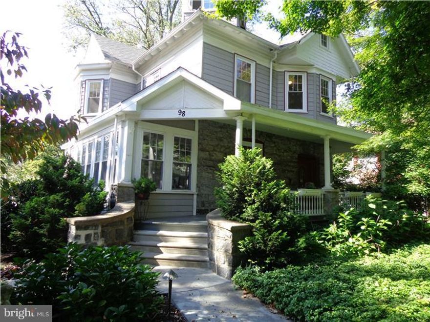 Lovely stone Victorian home, completely rehabbed in 2006, and situated on a large professionally landscaped corner lot. The large front porch leads to a beautifully carved front door with leaded glass, opening into the foyer and winding wooden staircase. This three-story home has it all. The original hardwood floors lead to the double-sectioned living room and formal dining room, both featuring large, triple bay windows which make for a bright, sunny environment. Take note of the tiled stone gas fireplace, as well as the two hidden pocket doors. The state-of-the-art kitchen with 12' stone square flooring features granite countertops, stainless steel appliances, stone tile backsplash, ample cherry cabinets, and two large pantry closets. A sunny, spacious breakfast room adjoins the kitchen, along with a convenient first floor powder room. The back door off the kitchen leads to a rear deck, driveway and large grassy, wrought iron fenced back yard. The second floor includes a master bedroom and three other bedrooms, all with neutral wall-to-wall carpeting, off the hardwood central hall. The master bath has all the amenities, including a large separate shower with a seat, and two lovely carved Victorian vanities. A hall door leads to a large third floor, including a full bath, wall-to-wall carpeting, and a design that affords many options. Also included in this exceptional home are two-zoned central air and heat, wide windowsills, high ceilings, garage, and rear driveway.