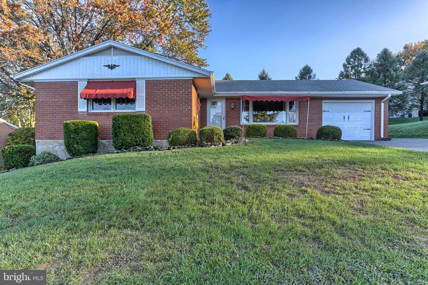One-owner, solid brick ranch with good bones and nice curb appeal in Central Schools * Outstanding quality in this 3 bedroom, 2 full bath home * Hardwood floors under the carpeting * Living room with a picture window allows for natural light and is open to the dining room * Dining room opens to the bright & cheery sunroom * Kitchen with all appliances, pantry closet and breakfast  bar * Owner's bedroom includes two closets and en suite full bath with walk-in shower * The lower level features a spacious finished rec room, a work room with a work bench and unfinished space for storage * Fenced yard, concrete patio & shed * Gas furnace and central air * Architectural shingle roof * Oversized one-car garage and extended driveway  Great location with easy access to I-83 and convenient to Route 30, ideal for the commuter!