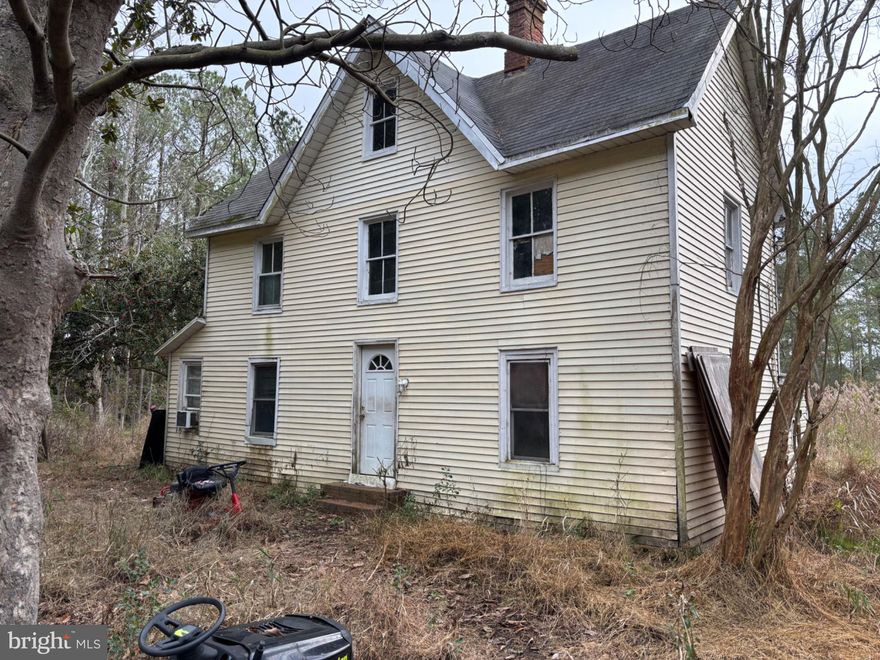 Located in a serene setting near the Pocomoke Sound of the Chesapeake Bay, this classic farmhouse-style home sits on 2 acres of land.  On a quiet road where you can't directly see your neighbors, with Deer, Turkey, and every kind of wildlife, this location is a dream for the Hunter or Fisher. Several boat launch/landings are near to the property, with quick access to the bay. The home needs some TLC, but it's priced right to be able to budget to make this your dream. Could be a great home or a perfect getaway, just a few hours from Baltimore, Washington, or Philadelphia.