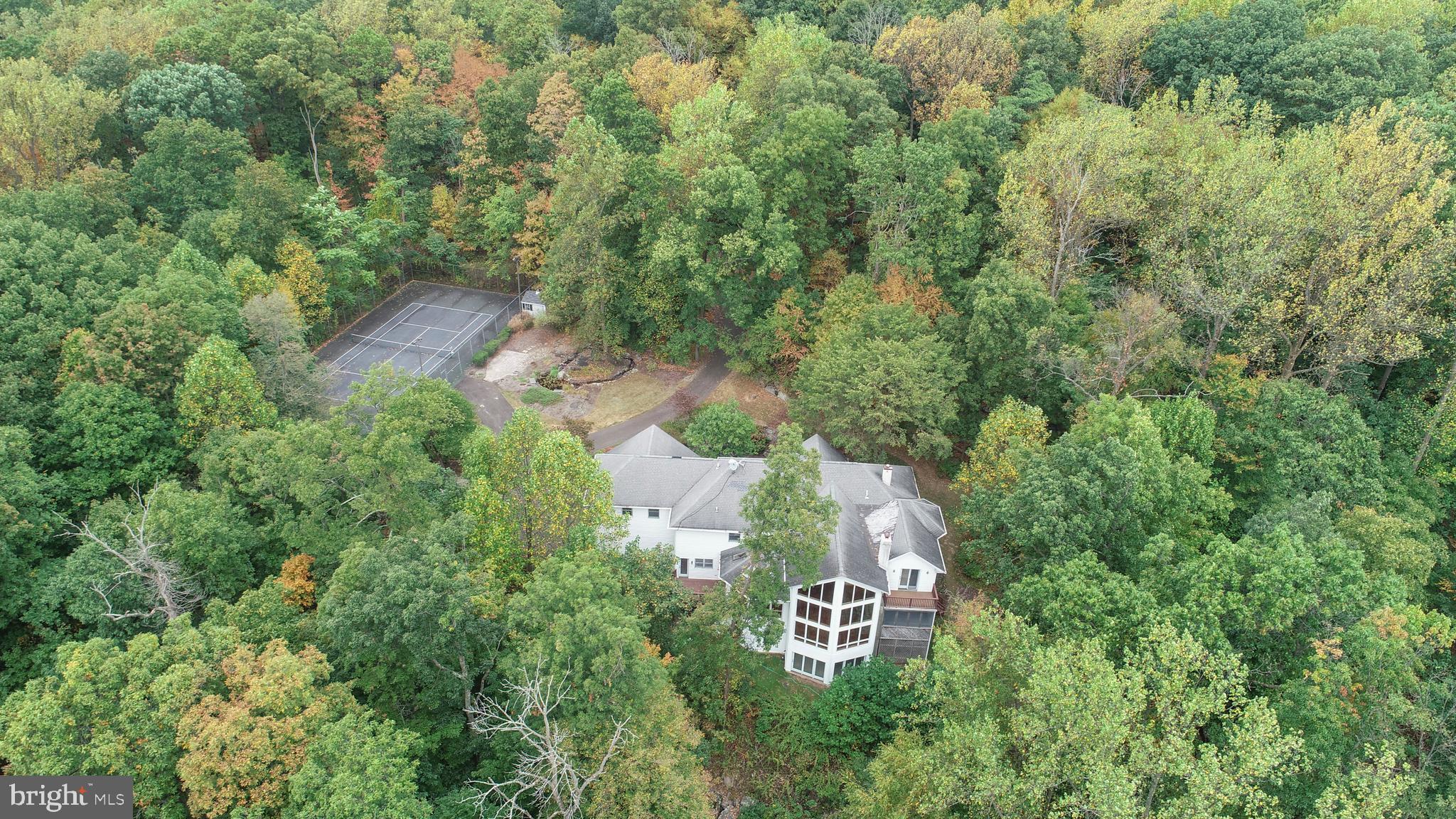 Have you ever seen a property that is just indescribable? This is one that you have to see to comprehend all it offers. Imagine, traveling down a private driveway through the woods to a clearing which showcases a brick home with a 3 car garage, a tennis/pickleball court, cascading water feature and unsurpassed privacy on 25 acres. Whether you're looking for a primary or a second home, you’ll love how this hillside beauty has room for all with views (all the way to Philly) that will wow you! Multigenerational living options.
Want to know more? Call or email for more information.