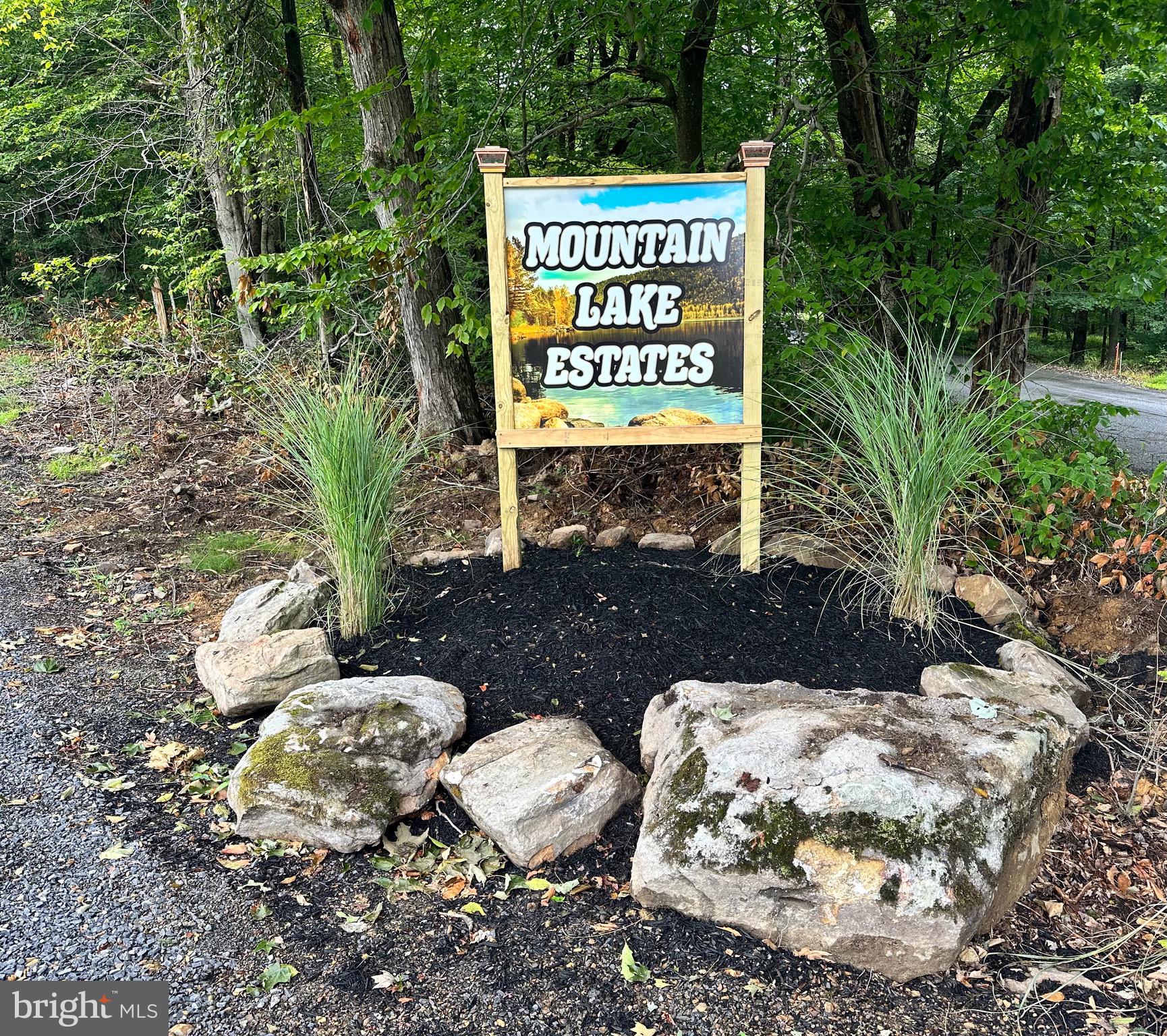 LOT #2 – “Pineybend”- Road Frontage on one side. Level Open Pasture Land with Nice Lake View. 75% Wooded, Very Private Setting. Secluded Building Site on rear of lot. New Survey. Tall Pine Trees for Privacy and Wind Reduction. New gravel main access road. Brand new 6" Pressure-Treated Posts (w/ Welded Wire Fence) around the ENTIRE Perimeter. Newly installed driveway, Perc Test Approved. 5 Min. Drive to Lake. Brand New Public Lake Dock/Ramp. Tons of Parking. Don’t Miss Your Chance! Possible Owner Financing! An Absolute "Wildlife Hotel" w/ Deer, Turkey & Squirrels Abound. Sensible Protective Covenants w/ hunting & shooting allowed. JUST REDUCED! ACT FAST!