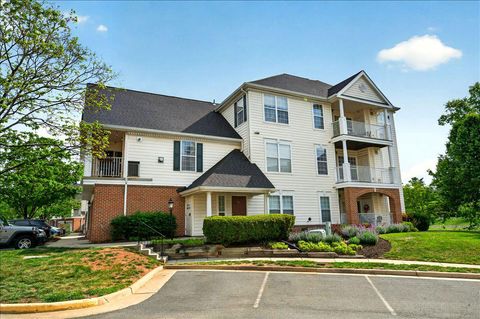 Photo of 25280 Lake Shore Square #205, CHANTILLY, VA 20152 (MLS # VALO2122032)