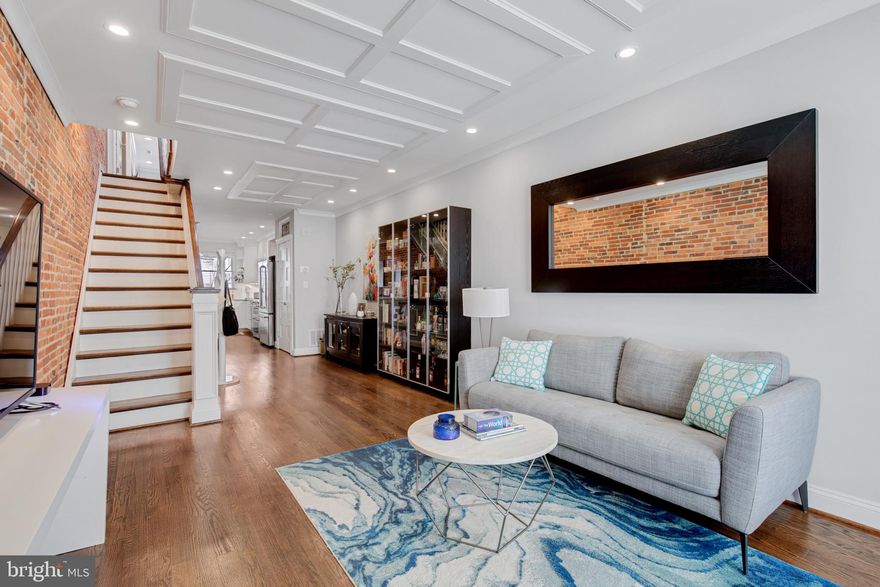 HIGHLY UPGRADED CHAP RENOVATION WITH LARGE OFF-STREET PARKING PAD LOCATED IN THE HEART OF CANTON ON SOUGHT AFTER BLOCK. FINISHED IN PLACE HARDWOOD FLOORING THROUGHOUT. ENJOY CUSTOM WHITE CABINETRY WITH FARMHOUSE SINK, UPGRADED TRIM, IMPORTED TILE, SUPER WHITE QUARTZ COUNTERTOPS, HIGH END SS GE CAFE APPLIANCE PACKAGE IN DESIGNER CHEF'S KITCHEN WITH OVERSIZED ISLAND AND UNDER CABINET LIGHTING. EXPOSED BRICK. CUSTOM BLINDS. LARGE KITCHEN PANTRY. TONS OF NATURAL LIGHT. FINISHED LOWER LEVEL. HIGH CEILINGS. TONS OF STORAGE. WALK-IN SHOWERS. WALK-IN CLOSETS - PRIMARY SUITE CALIFORNIA CLOSET UPGRADE. LOW TAXES. SPACIOUS 3 BEDROOMS WITH 3 FULL BATHROOMS. EXPANSIVE OVERSIZED ROOF DECK FOR ENTERTAINING WITH INTERNAL ACCESS - INCREDIBLE WATER AND CITY VIEWS. CLOSE PROXIMITY TO RETAIL SHOPPING, LOCAL DINING, PATTERSON PARK, AND ALL MAJOR HIGHWAYS. SCHEDULE A PRIVATE TOUR TODAY. ROUGHLY 3 YEARS OF CHAP TAX CREDIT REMAIN.