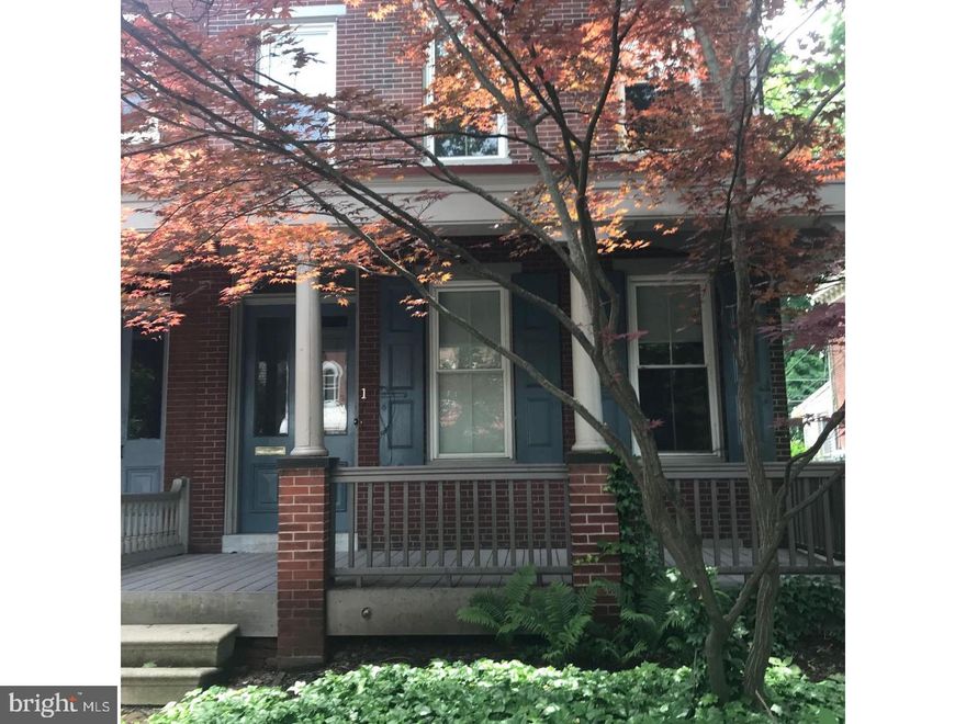 The charm of yesterday with the conveniences of today. Charming turn of the century brick twin on sought after South Walnut Street has a 2 bedroom unit with private entrance,your private, people watching front porch, updated kitchen with granite counter tops and eat in area, hardwood flooring in family room, updated bath with corner glass enclosed shower, a/c, two stacked off street parking spot, your own laundry, great attic walk in storage and use of common rear yard, Wow!!  Landlord pays water, sewer, lawn maintenance. Private front porch, off street parking spot. NOT A STUDENT RENTAL.  Owner is a licensed Realtor in the State of Pennsylvania.