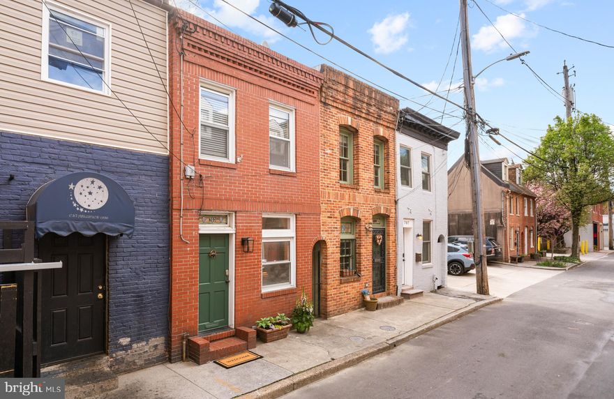 Back on the market! Discover this charming 2-bedroom, 1.5-bathroom home located on one of Fells Point's most picturesque streets. Start your mornings with a coffee from Pitango or The Daily Grind, explore the local farmer's market, or enjoy a relaxing stroll along the waterfront...Or maybe grab brunch with friends at Blue Moon, which is just moments from your front door. This inviting home on Bethel Street features an open layout that flows seamlessly into an updated kitchen, complete with stainless steel appliances, and a convenient half bathroom on the first floor. The enchanting rear patio offers an ideal space for summer barbecues and entertaining guests. Upstairs, you'll find two bedrooms, separated by a full bathroom, with laundry conveniently located on the same level. This is the quintessential Fells Point home!
