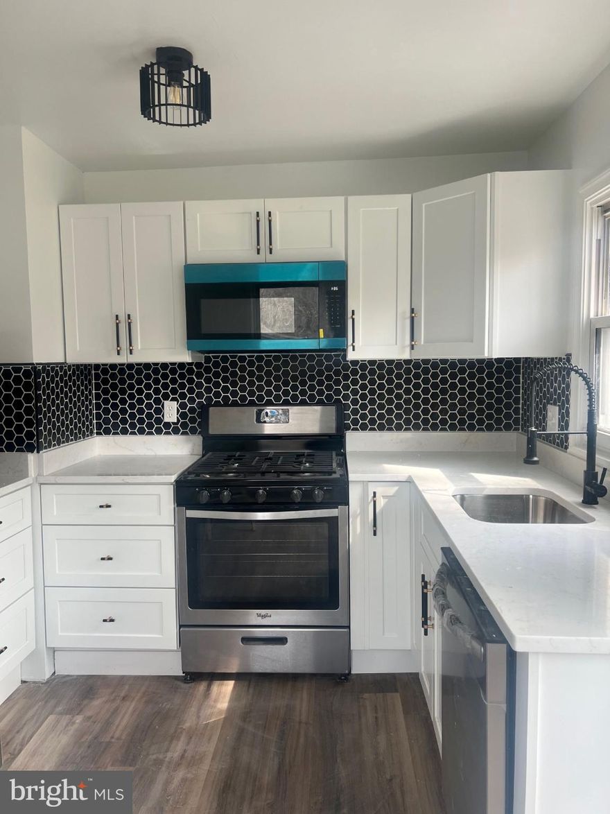 This Beautiful Updated 3 Bedroom, 3 Bath Features : Gourmet Kitchen with White Cabinetry and beautiful Quartz Counter Tops, Stainless Steel Appliances, 2 Bedrooms and a Full Bath on the main level, Unique Modern Light Fixers/Recessed Lighting, Gleaming Hardwood Floors, Large Primary Bedroom W/ Beautiful En-suite and Walk-in closets on the Top floor for your Private Oasis, Finished Basement with a Half bath great for entertainment. Great yard for Relaxation, Shed and 2 car Driveway. HSA HOME WARRANTY per agent remarks.  Schedule your Showing Today !!!