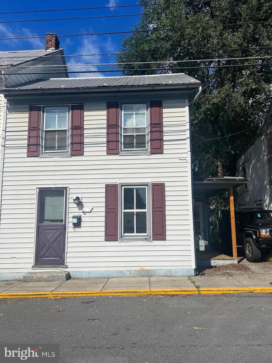 Here we have a spacious end row Townhouse located within the city limits of Martinsburg. Home has been freshly painted. Large fenced in backyard, separate laundry room,  original hardwood floors throughout the home. All appliances convey! Schedule an appointment to check out this Townhouse before it's gone! Must pass criminal and eviction history. Applications will be completed online. Income requirement is around $3300/month.