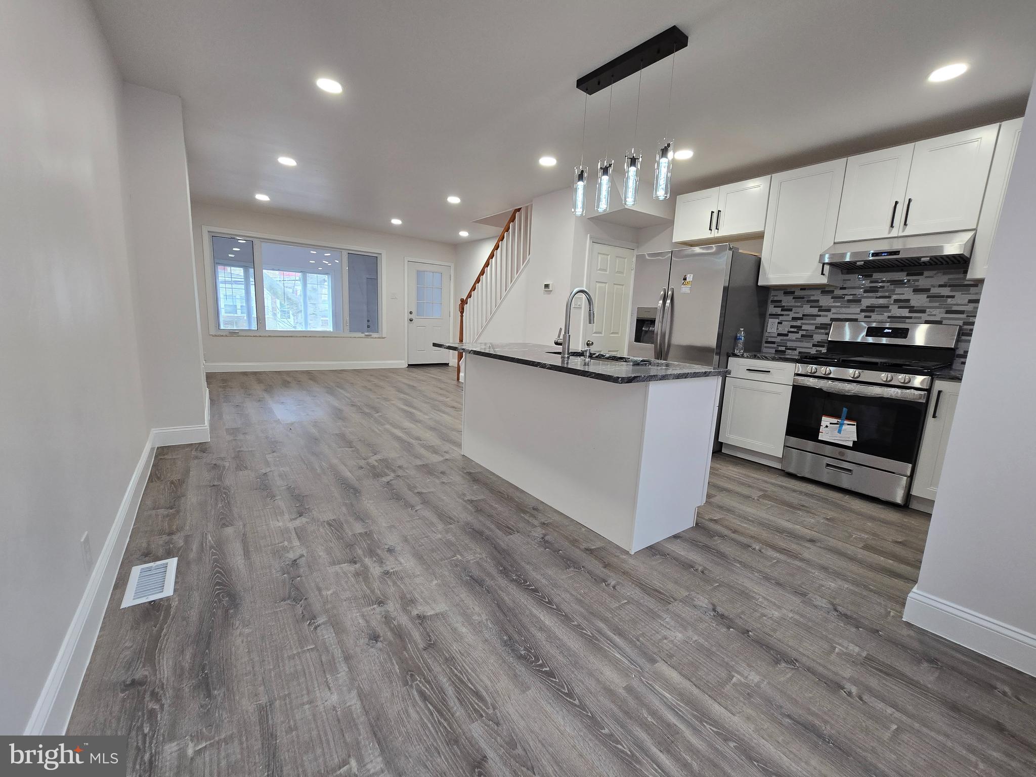 Welcome to 2523 S 62nd Street—where modern updates meet everyday comfort in the heart of Elmwood Park. This move-in ready home combines style and functionality, starting with an enclosed front porch filled with natural light—perfect for morning coffee or a quiet place to unwind.
Step inside to an open-concept layout that seamlessly connects the living and dining areas, offering flexible space for both relaxing and entertaining. At the center of it all, the kitchen features a sleek island with a built-in sink and bar seating, surrounded by ample counter space and clean, modern finishes.
Out back, enjoy a low-maintenance yard designed for easy outdoor living. With no grass to mow and a designated planting area, it’s the ideal mix of simplicity and potential.
Eligible buyers may also qualify for down payment and closing cost assistance programs. Explore your options to see what support may be available.