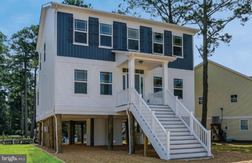 Move-In Ready - Inlet ll B Model offered by Gemcraft Homes New Construction CC LLC.   Two Story Piling home 4BR/3BA 1792 sq ft,w/ 32x10 decks. Main Level features Owners Suite w/Tray ceiling and large owners bath with double bowl sink, shower and walk-in closet & 2 additional BR's & laundry area.  Second floor boosts a spacious great room with 60" electric allusion fireplace, open kitchen with center kitchen island, granite counter tops, SS appliances, large pantry along and a 4th BR and full BA to completes the second level.  New Bulkhead approx 32'. Builder Incentives...call for your private showing today! Pictures may have upgraded features. Captains Cove Golf & Waterfront Community amenities offer: 9 Hole Pristine Golf Course, 3 Pools (2 Outdoor/1 Indoor), Fitness Center, & more. Pictures may have upgraded features. Captains Cove Golf & Waterfront Community amenities offer: 9 Hole Pristine Golf Course, 3 Pools (2 Outdoor/1 Indoor), Fitness Center, Boat Ramp, Basketball & Pickle-Ball Courts, Walking & Biking Trails, Dog Park, Security and more. Call for more information.