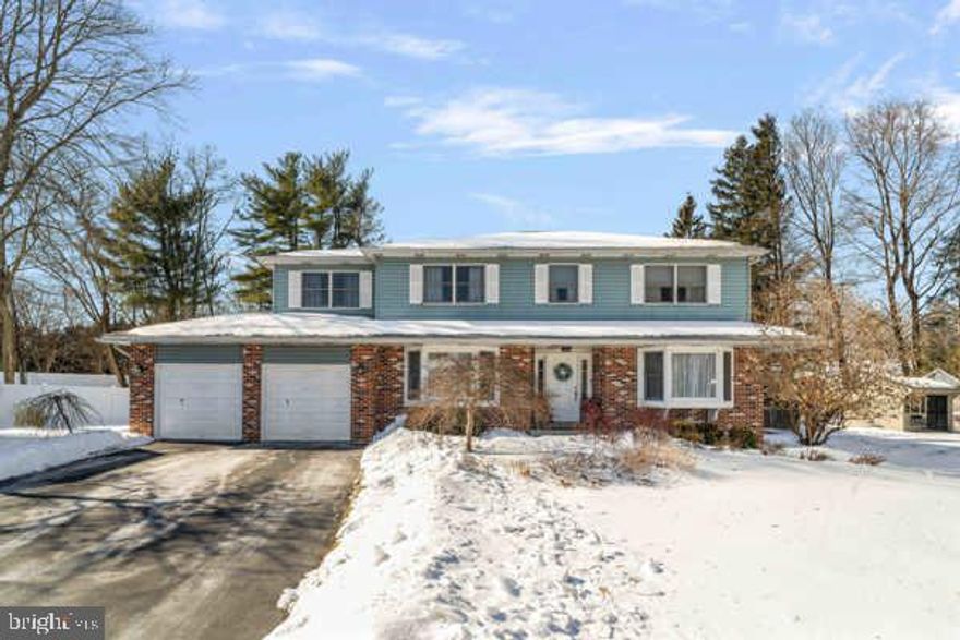 SHOWINGS BEGIN Saturday 2/14/26.......Your forever home awaits. Almost 3,000 square feet of living space plus a FULL FINISHED basement stands before you. Enter the desirable Woodlands neighborhood to the cul-de-sac location to find this impressive property.  5 bedrooms & 2.5 bathrooms (all bathrooms updated!) are spread out over a Colonial style home.  Combination brick & vinyl siding shows off the wonderful exterior. Beautifully landscaped with resealed driveway you make your way inside to see the charm abound. Great sized living room, family room & formal dining room takes toward the impressive, updated kitchen with newer Quartz countertop & flooring.  A separate laundry room on the back of the house operates duly as a mud room when you are in/out of the wondrous oasis of a backyard.  Fully fenced encompassing a massive saltwater in-ground pool, patio with designated gas line for your grill, a shed with newer roof & plenty of grass for everyone to run & have fun. Back inside to the 2nd floor to what you would expect for a home of this size to be great space in all 5 bedrooms. The master suite is fitted with the closet space you've always wanted, a sitting room & personalized full bathroom. Last but not least is the future of your entertainment in the fantastically finished basement with new flooring. You will find plenty of room for TV, exercise, workshop, rec area & great storage to compliment the large attic with walk up steps & 2-car garage.  Additional highlights of brand-new flooring in the bedrooms & basement, gas fireplace, replacement panels of the 6 foot & 8 foot sections of fencing, new automatic garage door openers, well maintained major systems that were installed barely a decade ago. Lifelong Andersen windows, basement drainage system, rear yard creek.  What else is here? Only one way to find out....