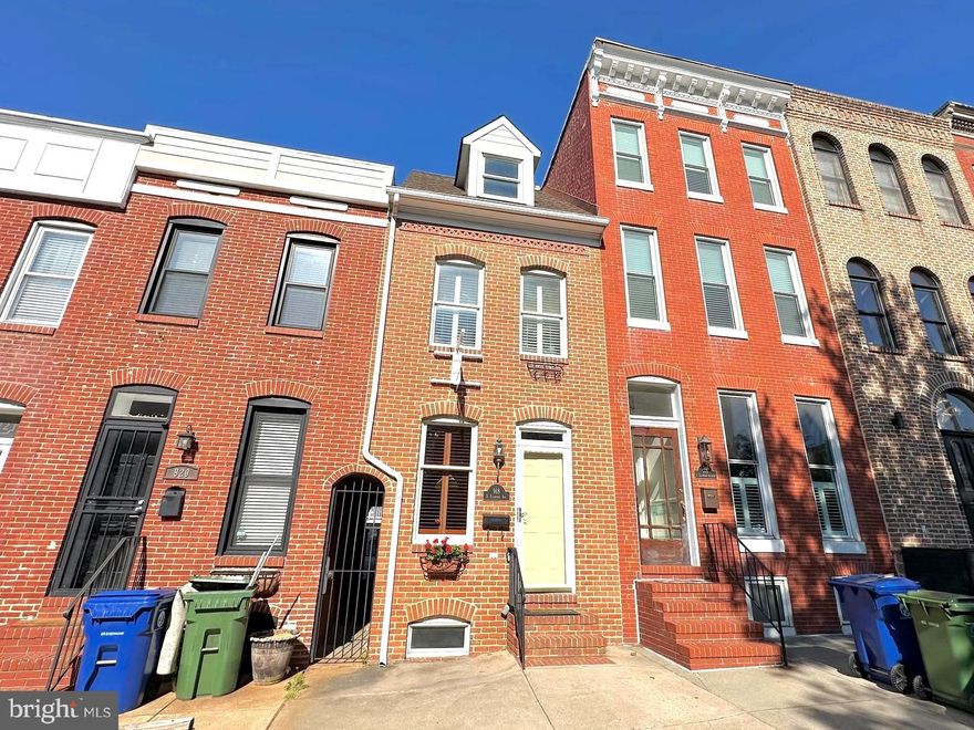 Welcome to this beautifully maintained townhouse in the heart of Canton, offering 3 bedrooms, 2.5 bathrooms, great outdoor space including a private deck and  rooftop terrace with stunning city skyline views. The MAIN LEVEL features a warm and inviting living area with a gas fireplace and exposed brick wall, a convenient powder room, and a dedicated dining space. The beautiful kitchen boasts quartz countertops, and ample cabinetry. Dining and kitchen areas have abundant natural light from rear and side windows, with access to a rear patio, perfect for relaxing or entertaining. On the SECOND LEVEL, you’ll find a spacious primary suite complete with an en-suite bath featuring a jacuzzi tub and generous closet space. This level also includes a second bedroom, a full hall bath, and a conveniently located laundry closet. The THIRD LEVEL offers a large additional bedroom with direct access to a private deck, leading up to a spacious rooftop deck with sweeping views of the Baltimore skyline and iconic city landmarks. The basement is clean and versatile, ideal for storage, and includes a second laundry area.  Additional highlights include hardwood flooring, carpeted bedrooms, recessed lighting, crown molding, exposed brick accents, a sprinkler system, HVAC system, and ceiling fans. This home also comes with a PAID HOME WARRANTY THROUGH APRIL 2030 for added peace of mind. 
Ideally located! very close  to O’Donnell Square, the Canton Shopping Center, grocery stores, Canton Waterfront Park, and Patterson Park, with easy access to I-95 and I-895. Schedule your showing today and experience everything this exceptional home has to offer!