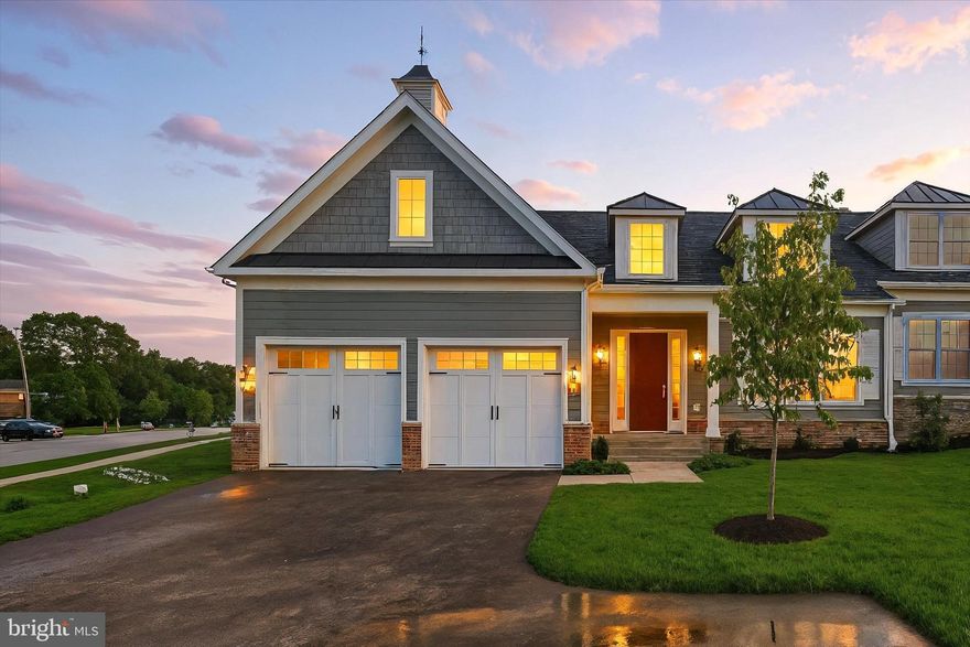 This beautiful new home features the Ellenham floor plan at the Villas at Woodbrook, a premier Keelty community! The Ellenham model offers the perfect combination of luxury and functionality.  The main level boasts a spacious owner’s suite complete with a private bathroom and a large walk-in closet. The design includes seamless flow between the living room, dining area, and kitchen, leading to a private rear deck and the stand out feature of a screened-in porch for bug free enjoyment. Upstairs, you’ll find 3 generously sized bedrooms and 2 full bathrooms, offering privacy and comfort. The expansive, fully finished basement includes another full bath and plenty of open space providing endless possibilities for additional living or entertainment ideas. **Photos are an example within our community of this Ellenham floor plan.**