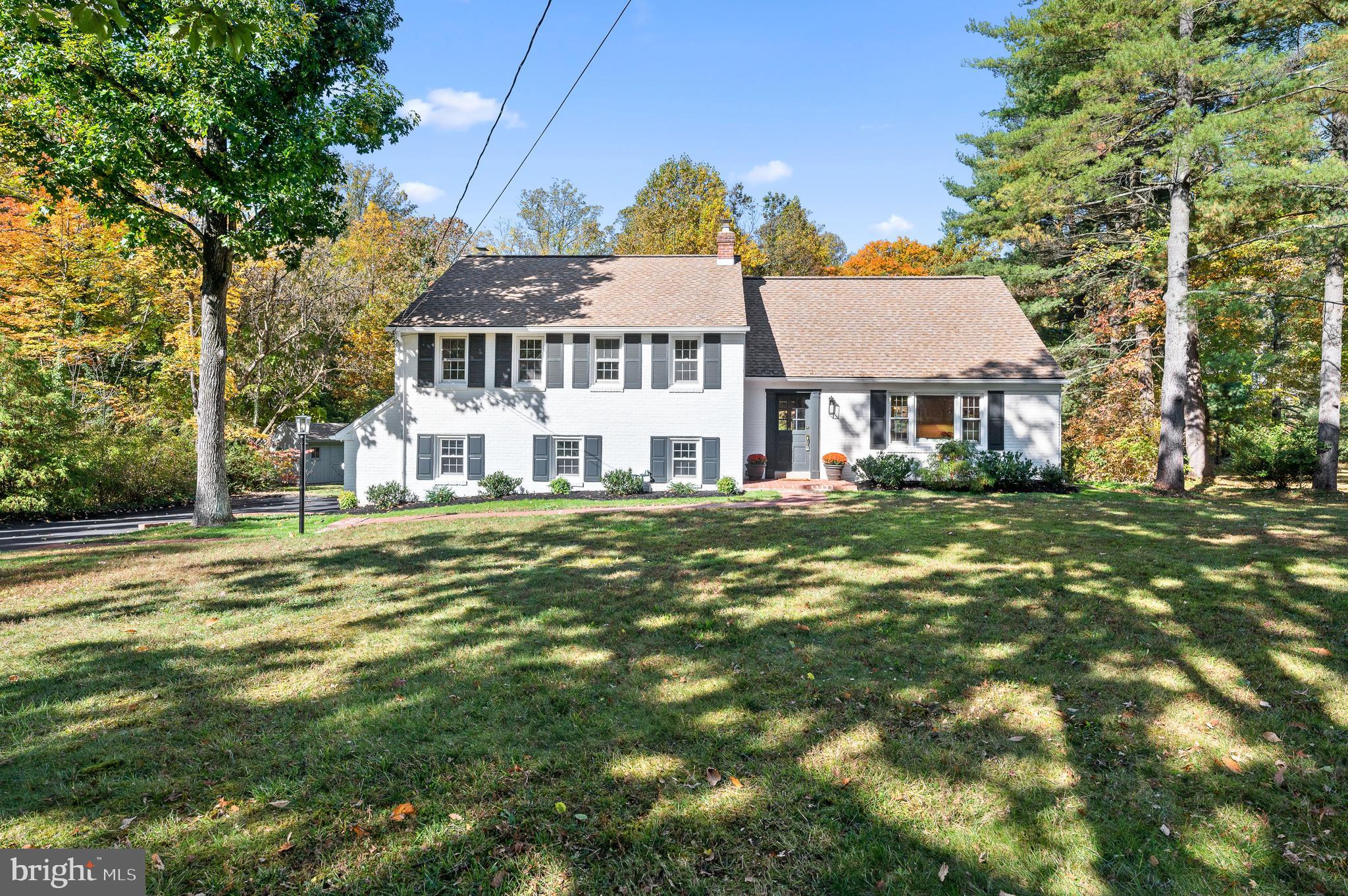 Stunning, renovated, 5-bedroom, Radnor Township home on a FABULOUS flat 1.23 acre lot! This 5 bedroom GEM has 3 brand new full baths, a powder room, and 2 car garage. This completely updated, move-in ready house sits in the very center of Philadelphia’s Main Line. Located in Villanova, this ultra-convenient location is sure to please, close to Starbucks, restaurants and the train. This home sits within a wonderful and very welcoming, walkable neighborhood, located in the coveted Radnor Elementary School district.
As soon as you walk in the front door, you will be awed by the fresh and current finishes, the beautiful light filled rooms and the stunning newly refinished hardwood floors. Enter the foyer and to your left is a coat closet, and to the right is a family room. Your eye is immediately drawn across the family room to the new gas fireplace with shiplap, the reclaimed mantle, and the custom bookshelves underneath two newly added windows. The family room is open to the new gourmet kitchen with a 9 foot island that comfortably seats five. The kitchen has been designed with timeless finishes such as white shaker style cabinets, quartz countertops and a subway tile backsplash along with new stainless steel appliances, a built-in microwave drawer and under-counter dual zone beverage fridge. The open dining room has a gorgeous view out onto the spacious deck and the private, flat and expansive backyard.
Downstairs is the large second family room with a painted brick fireplace with a great brick bench providing extra seating for future gatherings or football parties. There are plenty of windows facing the pretty views of the private backyard plus access to another deck. The lower level also has a powder room, a sunny laundry room with utility sink and a mud room area complete with custom built in bench with lots of hooks and room for storage. Strategically placed, the family foyer or mudroom allows easy access to the garage.
Upstairs the Main bedroom suite has it all! A newly framed large walk-in closet big enough for two, as well as a brand new bathroom with a walk-in shower, double vanity with marble countertop and a porcelain tile floor. This level also has two more bedrooms and a beautiful shared bath. This nice sized bathroom has been completely redone with all new fixtures and a bathtub. Also on this level is an oversized linen closet, and nice spacious landing.
Up another level on the right at the top of the stairs there are 2 additional bedrooms and a completely new Jack and Jill full bath with a penny round tile floor and bathtub. This level also has access to a very convenient walk in attic offering a ton of great storage.
If you are looking for a centrally located, beautifully renovated home in Villanova with Radnor Schools, it doesn’t get much better than this. Enjoy the peace of mind of having a brand new 2 zone HVAC system, a new hot water heater, and all new plumbing while relaxing in your comfortable newly updated home. When you are not outside enjoying your park-like property, you can join in on the annual neighborhood block parties, holiday cookie exchange, book club, gourmet theme dinners, take a quick ride to dinner at LaScala or jog through the pathways of Villanova University. This 5 bedroom home has been fully remodeled, landscaped and professionally designed with so much style, you won’t have to do a thing.