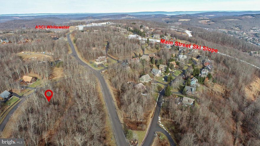 Level wooded building lot with scenic mountain views! This .78-acre homesite is centrally located minutes from Wisp Resort, Deep Creek Lake, Lodestone Golf Course, local restaurants, and nearby state parks, all while tucked away in a private mountaintop community. Ready to build with public water and sewer hookups to site. A straightforward opportunity to build your mountain dream home right in the heart of Deep Creek Lake. Call today for details.