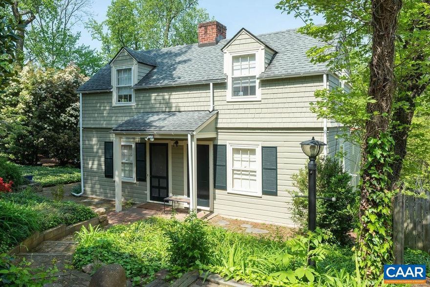 Charming, carefully maintained and upgraded home on an extremely quiet street close to the University and Barracks Road shopping. The original is 2 over 2 built in 1896, the addition dates from around 2000. This home has the tasteful charm only an older home can have. Quality materials, spacious, high ceilings, lots of light. There are two "primary suites" on the first floor, two bedrooms and a bath on the second floor. Sold "as is" to simplify, but there are no known problems.,Recycled Material Counter,Solid Surface Counter,Wood Cabinets,Fireplace in Living Room