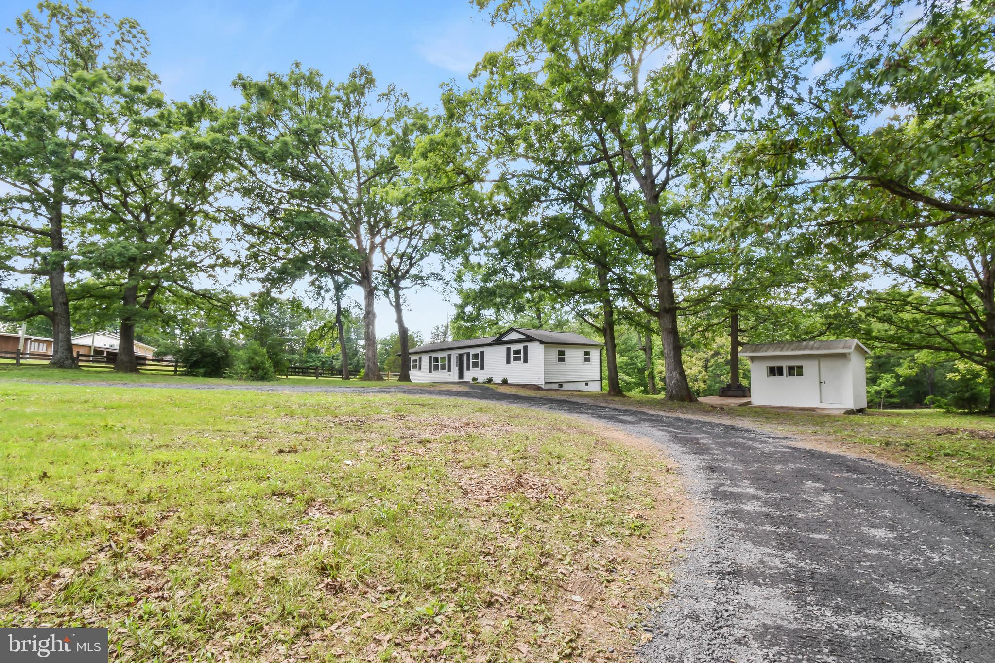 Beautifully Updated 3-Bedroom Home on 1.5+ Acres in Winchester, VA
Don’t miss this move-in-ready gem—an updated 3-bedroom, 2-bathroom home situated on over 1.5 private acres in beautiful Winchester, Virginia. From top to bottom, this home has been thoughtfully renovated with modern finishes and quality upgrades throughout.
Step inside to find brand-new hardwood floors, fresh paint, and modern light fixtures that brighten every space. The spacious living room features a soaring cathedral ceiling, creating an open and airy feel that’s perfect for relaxing or entertaining.
The kitchen has been completely transformed with new stainless steel appliances, stylish cabinets, and updated finishes—making it the heart of the home. Both bathrooms have been fully remodeled with clean, contemporary design.
Comfort and peace of mind come standard with a long list of major updates, including a new roof, new siding, new windows, new gutters, and new carpet in the bedrooms. Outside, enjoy your morning coffee or host guests on the 16x12 deck, with plenty of room to roam and play in the expansive yard. A storage shed offers even more convenience.
This turnkey home blends style, comfort, and functionality—all in a serene setting with just a short drive from Winchester's amenities and access to interstate 81 and route 7. Schedule your showing on showing times today. You won’t be disappointed!