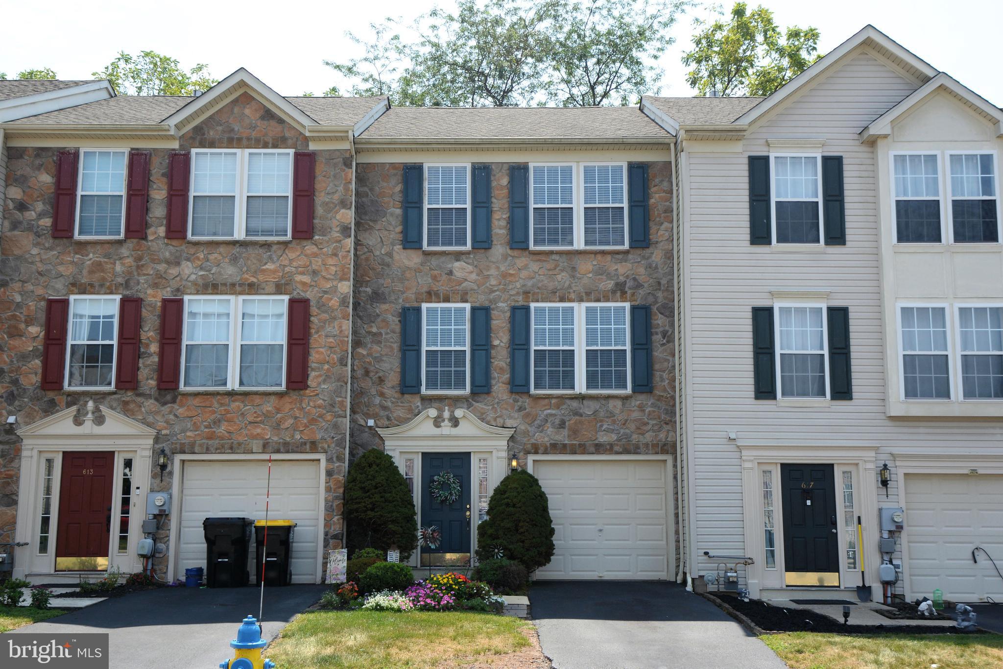Located in Beaver Run Village, this sun-filled 3-story townhome offers 3 bedrooms, 2.5 baths, and effortless modern living. A Generac WHOLE HOUSE generator is part of this sale and brings peace of mind during stormy weather. Better yet, the exterior is in excellent condition and the roof was just replaced a few years ago by the HOA. This residence has one of the best locations in the community, backing up to wooded space, where you can relax on the wooden deck or patio and enjoy the peace and calm that nature provides. The entry level greets you with a versatile flex space—perfect as a home office, fitness room, or cozy media lounge—plus convenient interior access to the garage, the laundry room, and a walk-out to the backyard patio. This level is finished off by a coat closet and half bathroom.
Upstairs, the main level features an open-concept living/dining area. The kitchen amenities include a center island, granite countertops, stainless appliances, ample cabinetry, and a pantry. Through sliding glass doors in the breakfast room, you can access the large deck which extends across the back of the house. Don’t miss the staircase down to the ground level, making dog walking a breeze!
On the top floor, the primary suite includes a walk-in closet and an en-suite bath with a dual vanity, stall shower and large soaking tub. This level is rounded out by two additional bedrooms which share a hall bath. The low-maintenance exterior of this property keeps your weekends free! Close to Rt 309, 663, 313 and the Pa Turnpike, this location is a dream for those who commute. Showings will start with the Open House this Saturday 10-12PM.