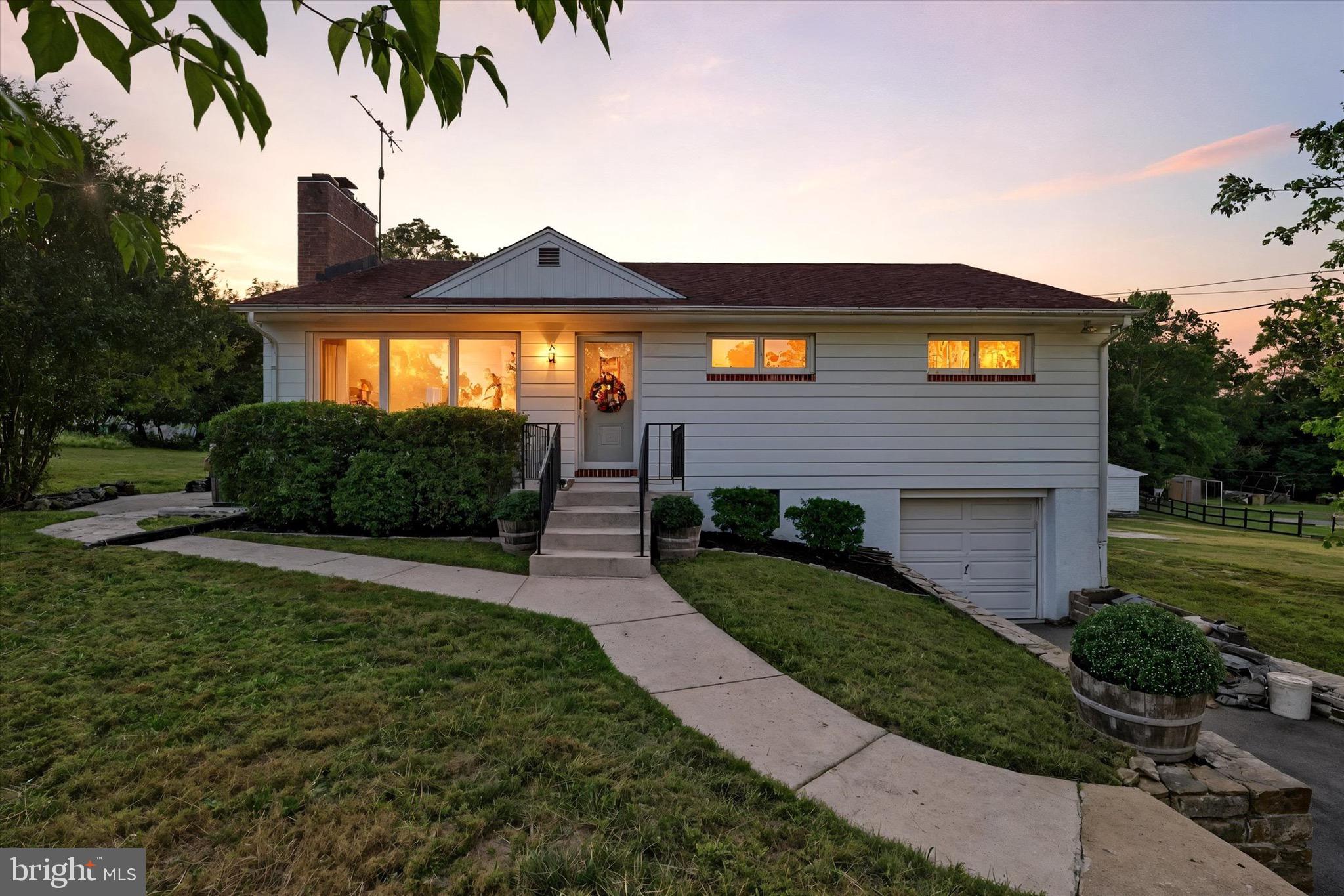 Lovely 3 bedroom raised rancher with an almost unlimited amount of garage space tucked away in a quiet neighborhood on a captivating park-like lot. This beautiful home with lots of extras is sure to please. Close to it all in HOWARD COUNTY but enjoys privacy, located on a NON-THRU Street at the back of a beautiful cul de sac and backing to open wooded space. This home really has it all. Brand new stainless steel appliances, brand new carpet and padding, freshly painted through out. Options to add a full bathroom in the basement. Detached 28x28 massive garage with electric that is perfect for your car collection or workshop/storage. Enjoy nearby charming shops, diverse dining, scenic parks, and the historic appeal of Old Ellicott City with its boutiques, restaurants, and seasonal events. Patapsco Valley State Park is just minutes away for outdoor recreation, while commuters appreciate the home’s proximity to US-29, I-70, and MD-100, ensuring easy access to Baltimore, Washington, Columbia, and beyond. Tax record finished square footage is not accurate
