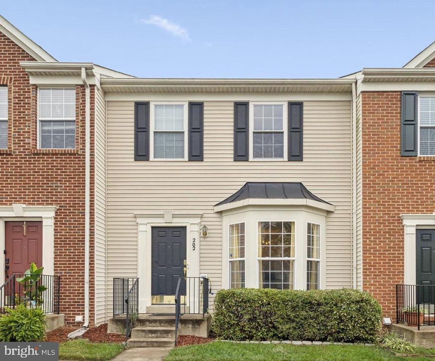 New Price Reduction: Nestled in the charming Dogwoods community, close to Quantico, this exquisite interior row townhouse offers a perfect blend of traditional elegance and modern convenience. Built in 2005, this residence showcases a timeless architectural style, enhanced by its durable vinyl siding that promises both beauty and low maintenance. As you approach the property, you'll be greeted by 2 assigned parking spots and inviting sidewalks that lead you to your front door. The outdoor space features a delightful deck, perfect for morning coffee or evening gatherings, allowing you to enjoy the serene surroundings of your new home. Step inside to discover a thoughtfully designed layout that maximizes comfort and functionality. The heart of the home is the gourmet kitchen, equipped with high-end stainless steel appliances, including a built-in microwave, wall ovens, cooktop, and refrigerator. Brand new kitchen floor just installed and HVAC replaced in 2023. New roof installed 10/7/2025.  The spacious basement living area is enhanced by a cozy fireplace, creating an inviting focal point for relaxation and gatherings. The property features a walkout basement, providing additional living space that can be tailored to your lifestyle-whether it's a home office, gym, or entertainment area. The possibilities are endless, allowing you to create a space that truly reflects your personal style. With two assigned parking spaces, convenience is at your fingertips, making coming home a breeze. The Dogwoods community also offers delightful amenities, including tot lots and playgrounds, perfect for enjoying the outdoors. This residence is not just a home; it's a lifestyle. Experience the perfect blend of comfort, luxury, and community in this stunning townhouse. Don't miss your chance to make this exceptional property your own.