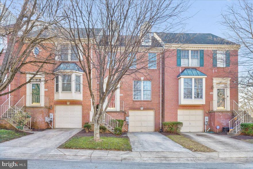 Nestled in a serene cul-de-sac close to Fairway Hills Golf Course, this stunning three-level townhome offers the epitome of modern comfort and convenience. The main level greets you with warm wood floors and a spacious living room, seamlessly flowing into a chef's kitchen boasting stainless steel appliances and elegant quartz countertops. A formal dining room opens onto a charming deck, perfect for serene morning coffees. Upstairs, three inviting bedrooms await, including a luxurious primary suite complete with a vaulted ceiling, walk-in closet, and a lavish full bath featuring dual vanities, a separate shower, and a indulgent soaking tub. The fully finished walkout lower level provides additional living space, ideal for recreation or relaxation.  New HVAC  in 2019, the roof in 2014 and the hot water heater was recently installed.