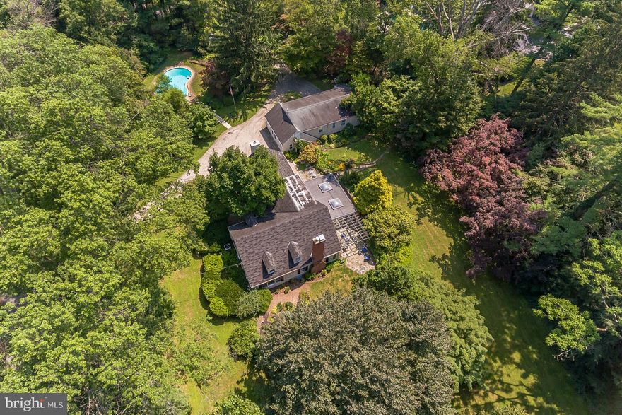 Opportunity awaits in one of the Main Line's most prestigious neighborhoods!  Renovate, expand, build your dream home or explore the possibilities of the 3 separate parcels. The 2.33 acre property is comprised of 3 separate tax parcels; Two  1+ acre buildable lots totaling 2.06 acres and a .27 acre parcel. The .27 acre parcel is directly behind the one acre parcel with the house. Please refer to plot plan that identifies the 3 parcels. The  property has a  charming 5+ bedroom Walter Durham Cape Cod style home with first floor master and a separate accessible bedroom and bath, delightful terraces and gardens, a detached garage with quaint 2 bedroom apartment, and swimming pool.  The property has a circular driveway with entrances from Parkes Run Lane and Harrison Road. 743 Parkes Run Lane is located in Radnor Township, Delaware County in the nationally ranked Radnor School District. Established location in the heart of the Main Line close to the town of Wayne, shops and fine dining as well as Septa's R5 Train to Center City Philadelphia\. Easily accessible to the Philadelphia International Airport, Routes 476, 76 , Rt 202 and the Pennsylvania Turnpike. The parcels will not be sold separately. Seller will consider selling the two 1+ acre parcels only.