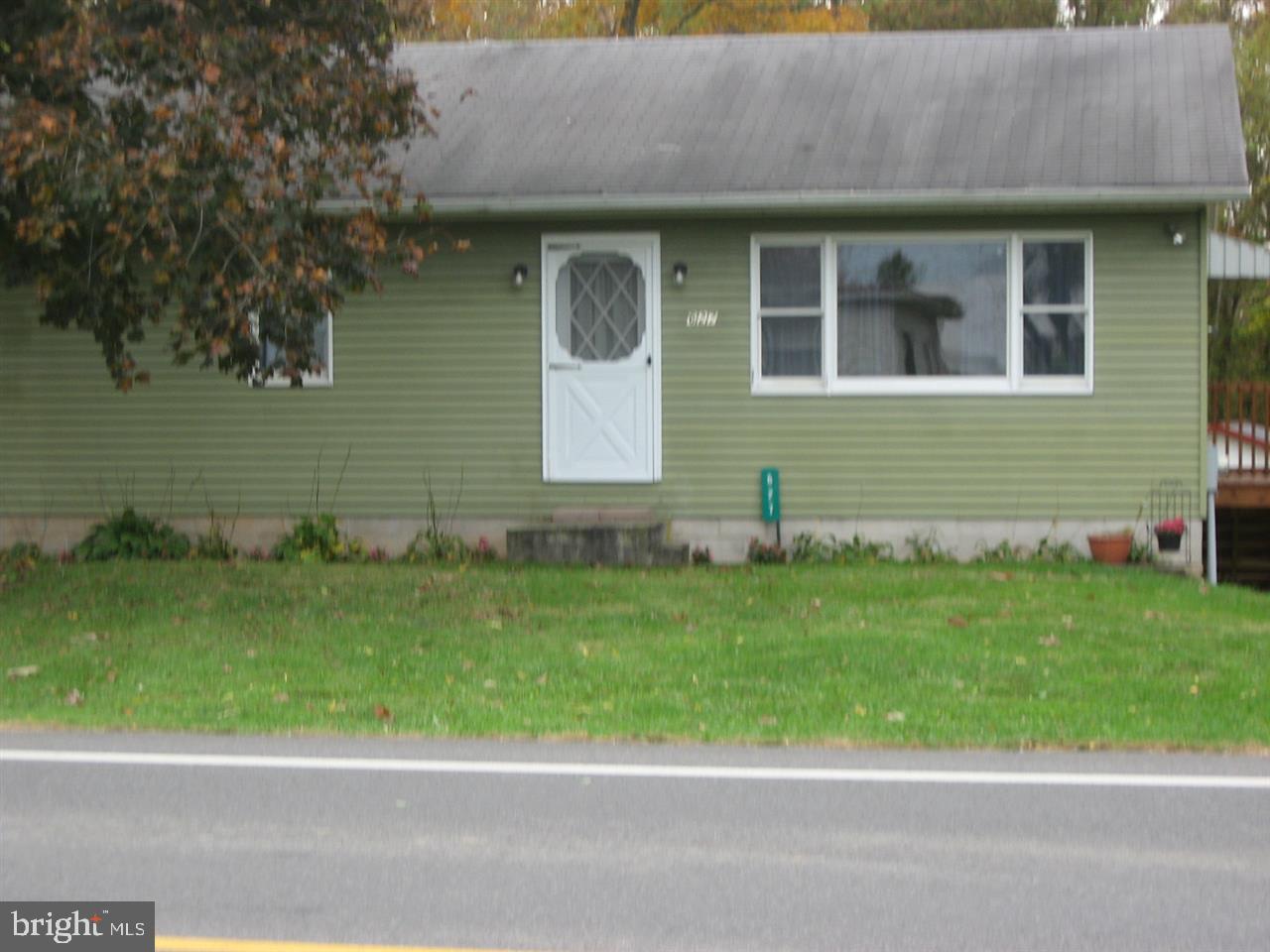 Move in ready in this beautiful country home located in Upper Adams Schools. 3 bedrooms and 1 1/2 bath home sits on an acre lot with woods in back to watch the wildlife. This home has a 3 car detached garage with electric in. I car garage in basement. Basement is just waiting to be finished and is a walkout basement. Loads of cabinets in kitchen. Nearly new carpet and recently painted. So nice for a car enthusiast.This one won't last long.