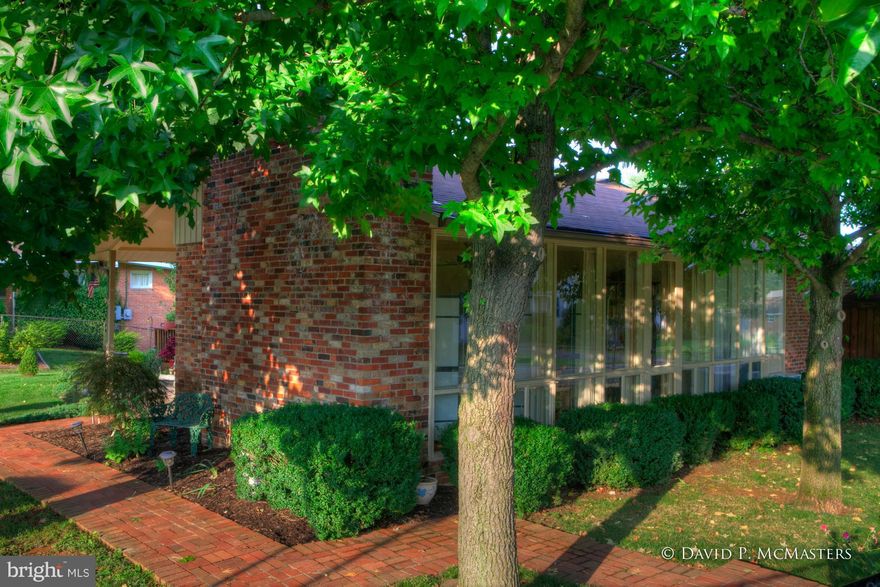 Architect designed custom brick rancher in desirable,quiet,  west end neighborhood, Close to Park, Hospital, Marc Train.  Full finished basement.  Nice shade trees.  Fenced yard. Two fireplaces.  Wood and ceramic floors. Lg. Family Rm addition ,skylights, wall of windows. Granite countertops. Immaculate. Huge, wrap  deck w/ screened gazebo. Patio.NEW HVAC 2013. Highly attractive home. Charming.