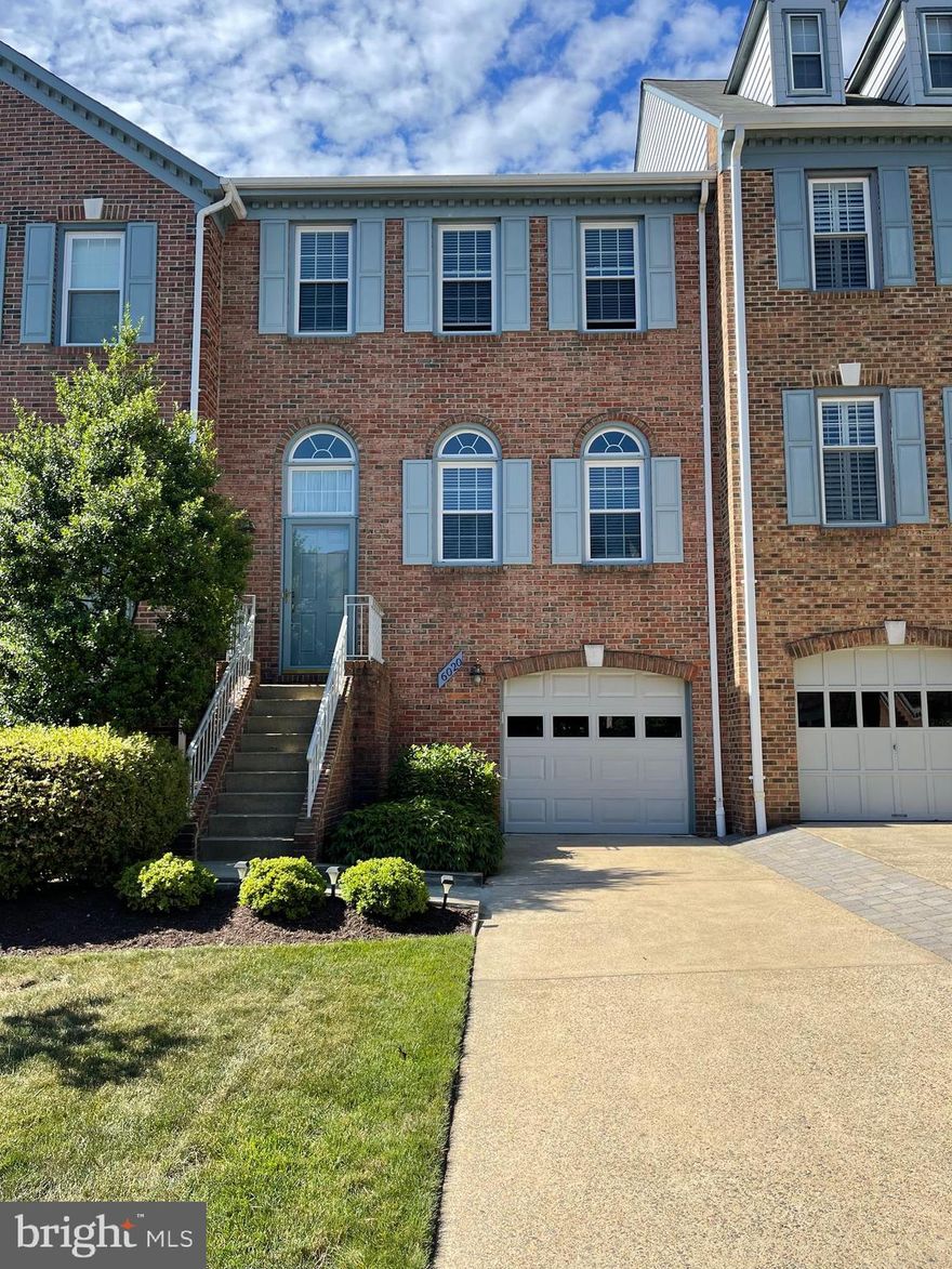 Fall in love with this immaculately maintained garage townhome in Kingstowne! Enjoy spacious living over 3 levels including 3 bedrooms, 2 full newly renovated bathrooms, and 2 half baths. Enjoy your chef's kitchen, with refinished cabinets, quartz countertops, and stainless steel appliances. Stainless steel dishwasher replaced in 2023, stainless steel refrigerator ( 2021). Tons of counter space for prep work! Exit the breakfast room to enjoy the views from the spacious sun deck overlooking the grassy common area. Primary bedroom boasts a huge walk-in closet and attached luxury master bath. Two additional large bedrooms complete the upper level. 
Features: hardwood flooring on the entire main level, quartz bathroom vanity in bathrooms, and large deck. The lower level recreation room with cozy gas fireplace with remote and go out to a well-landscaped patio and private, fenced back yard with retractable awning. 
Close to shopping, restaurants, major commuter routes and 2 metro stations. Kingstowne amenities include Two outdoor swimming pools, Two fitness centers, One, aerobics studio, Three community centers, Six tennis courts, Three multi-purpose courts, Three sand, volleyball courts, Twenty-five tot lots, Twelve miles of paved trails, Aqua aerobics classes, Group fitness classes, Karate classes, Kids summer camp, Latin dance classes, Massage services, Personal training, Soccer classes, Tennis classes, Clubs and interest groups, and Monthly events. Pets case by case.