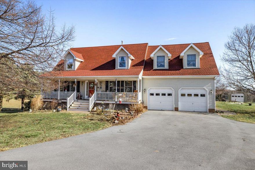 Nestled in the peaceful countryside, this classic Cape Cod home sits on 5 scenic acres, offering breathtaking views and plenty of space to enjoy country living. With five bedrooms, three and a half baths, and a fully finished basement with a second kitchen, this home is perfect for  multi-generational living or hosting guests.
The first floor features crown molding, creating an elegant touch throughout the spacious living areas. A brand new roof, new appliances and new storm doors ensure modern convenience and peace of mind. The fenced in yard provides a safe and secure space for pets or children to play. Outside, a detached garage and barn offer plenty of storage or workspace, making this property ideal for hobby farming, horses, or additional projects. Whether you are enjoying the privacy of your acreage, relaxing on the porch or deck, or entertaining in the finished basement, this home combines classic charm with modern updates. Don't miss the opportunity to own this beautiful country retreat-schedule your private showing today!