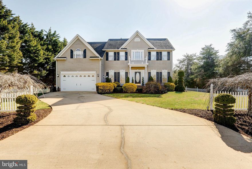 Gorgeous Lake Anna water access home located on the public side of the lake with boat slip #17. High speed Xfinity Comcast is available here! This immaculate home has over 3,800+ sqft and features 5 bedrooms, 2.5 baths (3 bedroom septic) and a home office. So many upgrades throughout to include crown molding, chair rail, hardwood flooring and 9ft and 10ft ceilings. Eat-in kitchen with granite counters, Samsung stainless appliances and a center island that is open to the large family room that showcases a beautiful gas stone fireplace. Separate living room, formal dining room and study room. Large primary suite has his and her walk-in closets, electric fireplace, double vanity, garden tub and a separate shower. Three other bedrooms and a full bath complete the second level. Finished basement with a family room, bedroom, office and an unfinished storage area. Washer and dryer convey! Enjoy summer BBQ's on the back deck. Beautifully maintained yard with a wooden bridge on the property and a water view. The fire pit and the 10x16 shed convey. Fenced in back yard, fenced in front yard and a concrete driveway! Take a stroll down to the waterfront common area where you'll find your own boat slip, a boat ramp, sandy beach and picnic tables. Close to The Cove restaurant, marinas, Tim's at Lake Anna, Moo Thru ice-cream, Taphouse, wineries and breweries. Relax and enjoy the lake life here!
**New stainless appliances and granite counters 2020, Two oversized Train HVAC units replaced 2020, new sump pump 2021, new pressure tank 2015**