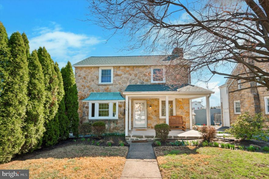 Your new rental home in Havertown just hit the market! This stone Colonial home has charming curb appeal and is equally inviting once you step inside! At just over 2200 SF of finished space, it will provide plentiful room for its next occupant, with 4 bedrooms, 3.5 bathrooms, partially finished basement, and attic space. It also includes an additional lot for an oversized yard space to enjoy - a rare find in Havertown! The home's main level includes the bright living room with wood-burning fireplace centerpiece and built-in shelving, formal dining room with bay window, and updated kitchen with ample white shaker cabinetry, granite counters, tiled backsplash, and recessed lighting. Here, you'll also find the mudroom with bench and storage, pocket door to the powder room, and door leading to the large deck with yard access. Head upstairs to the primary bedroom, including remodeled ensuite bathroom with stall shower. Another 3 bedrooms and hall bath complete this level - all bedrooms include ceiling fans with lighting. There's also the partially finished walkout basement with full bathroom, which provides versatile usable space - make it an office area, 5th bedroom, or whatever suits your needs! The unfinished space includes utility area and laundry. A floored attic with pull-down stair provides additional storage space. 1-car attached garage and shared driveway. Additional features include radiant heating, 2 flagstone patios, storage shed, new concrete pad covered front porch, plentiful closet space,  new roof 2023, and a tree-lined lot for privacy. This home has been lovingly cared for and received many upgrades that its next occupant is sure to enjoy - most recently it was freshly painted with hardwood floors refinished. This home really shines inside and out! Schedule some time to see it and make it your next rental home!