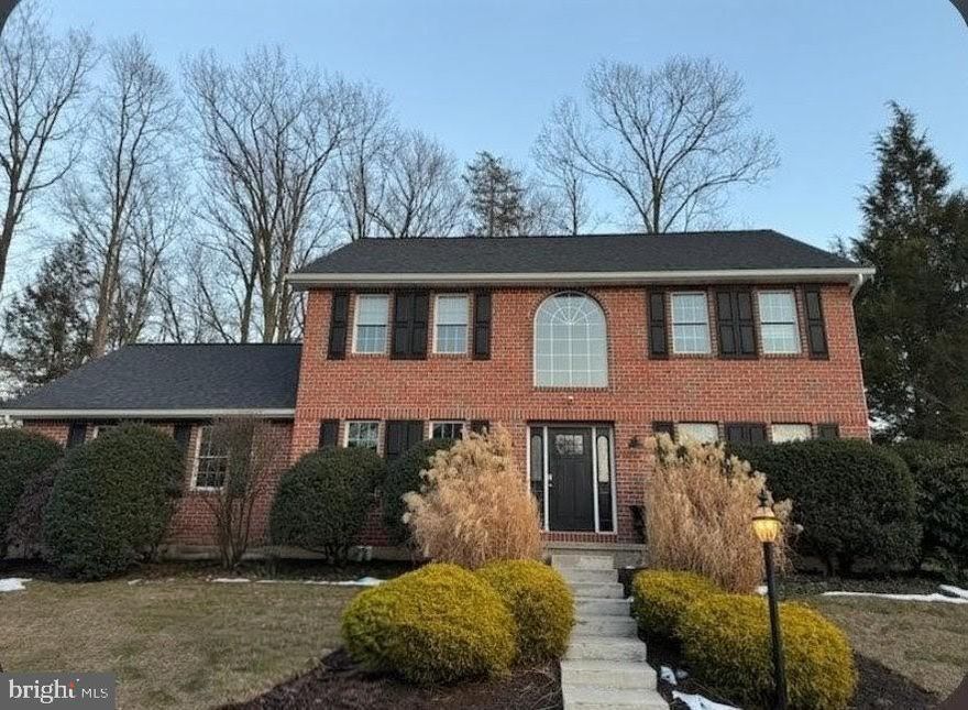 BACK ON THE MARKET   due to no fault of the home - Buyer  never delivered on the earnest deposit. Welcome to this stunning 2-story brick colonial, perfectly situated on a desirable corner lot in  sought-after Norwegian Woods. This home, in the Pottsville Area School District masterfully blends classic charm with contemporary living. Step into a two-story foyer complete with a beautiful tiled floor and palladium window that floods the space with natural light. An open stairway offers a view to the second floor while the foyer is flanked by a formal living room to the right of the entrance where there is a corner stone propane fireplace and to the left of the foyer is a separate, formal dining room. The heart of the home is the rear-facing kitchen featuring sleek granite countertops and island, stainless steel appliances and a tile floor. Sliding glass doors lead from the kitchen to an outdoor patio creating an ideal setting for al fresco dining and entertaining. A convenient first-floor powder room and laundry room complete the main level. Upstairs is the expansive primary suite. It features a private en-suite bath with luxurious garden tub and a skylight for a spa-like feel . Three additional spacious bedrooms and a full bath provide comfort for family and guests. This home is equipped with central air and a heat pump with back up propane for year - round comfort.  This property also boasts a newer roof and furnace, a fenced in yard and a two-car garage. Don't miss your chance to own this magnificent home. Call for your showing  appointment today !