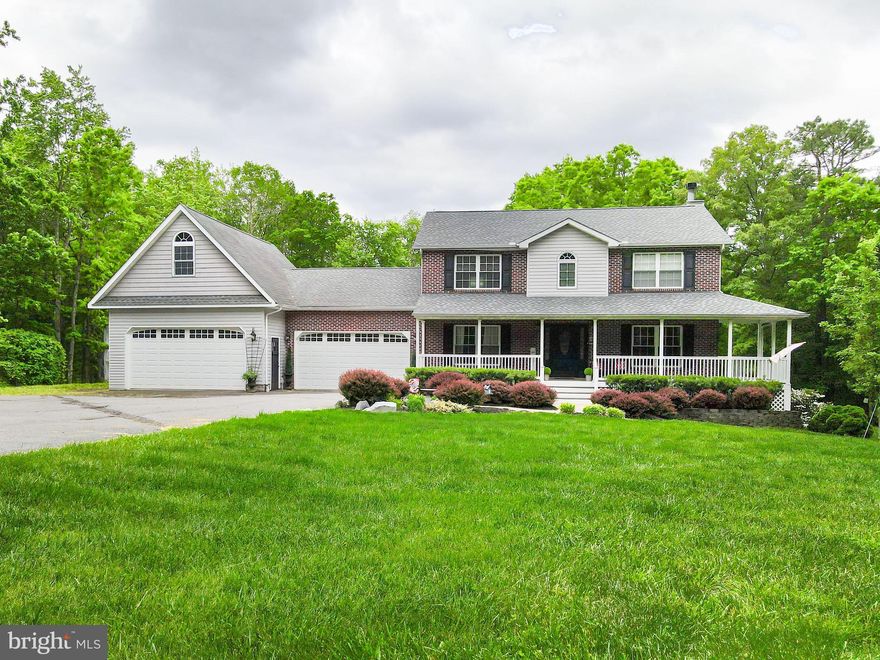 Welcome to this stunning four bedroom,  two full bath and two half bath colonial with a finished basement and a four car attached garage. Situated on 1.84 acre lot, with a beautiful front porch. This home boasts a backyard oasis complete with an above ground pool - perfect for relaxing or entertaining guests during those hot summer days. The layout of this home provides ample living space for your family, while the finished basement offers additional room for a home office, gym, or recreational area which features a walk out to a covered porch and the rear yard. Also, you will find a tucked away office on the first floor.  The four car attached garage ensures plenty of parking and storage space for your vehicles and outdoor equipment with a large storage area above that could be finished. This property backs to trees and common space providing a peaceful and private setting for you and your family to enjoy. The natural surroundings add to the beauty and tranquility of the home, making it a perfect retreat from the hustle and bustle of daily life.  Close commute to Rt 40, I-95 and local amenities.  Don't miss out on the opportunity to own this beautiful home - schedule a tour today and envision yourself living in luxury and comfort in this one-of-a-kind property!