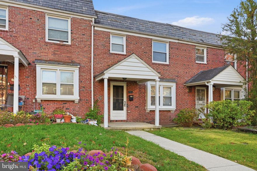 Newly refreshed 3BR/2BA Townhome located on a quiet street in Ednor Gardens.  Make your way to the covered front porch and open the door into your new home.  Step inside a home filled with natural light, hardwood floors, recessed lighting, an open floor plan, and a freshly painted interior.  The main living space offers a large living room open to the dining room and kitchen.  The kitchen features plenty of cabinets, stainless steel appliances, granite countertops with a complementing tile backsplash, and additional counter space with a raised breakfast bar with pendant lights and seating for three or more. On the newly carpeted second floor are two sizable secondary bedrooms, a larger primary bedroom, and a full bath with a linen closet.  The lower level offers additional living space featuring a full bath with walk-in shower, laundry, storage, a large family room, and a walk-out to the fenced yard.  From the kitchen step outside to a spacious yard with a large patio and a detached one-car garage. This home is move-in ready with so much to offer new homeowners and is located in close proximity to shopping, restaurants, and commuter routes.