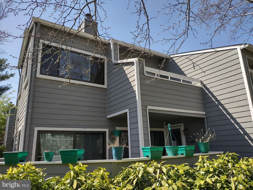 Large top level 2 bedroom and 1 bath Condo with skylights, upgraded kitchen with Granite, Tile, and SS appliances. New updated bath in hall way, with door access from Primary Bedroom. Primary Bedroom also has another sink inside it! Recessed lighting, 2 sided fireplace, Balcony. NEW Carpet inside and tile in kitchen/dining area. Water/sewer/trash/parking included. You Get Reston Amenities ! Walking paths etc. Walk to Lake Thoreau and Lake Audubon. Shopping center across the street. Metro rail not far. Dulles is close, major highways also. Open Parking lot