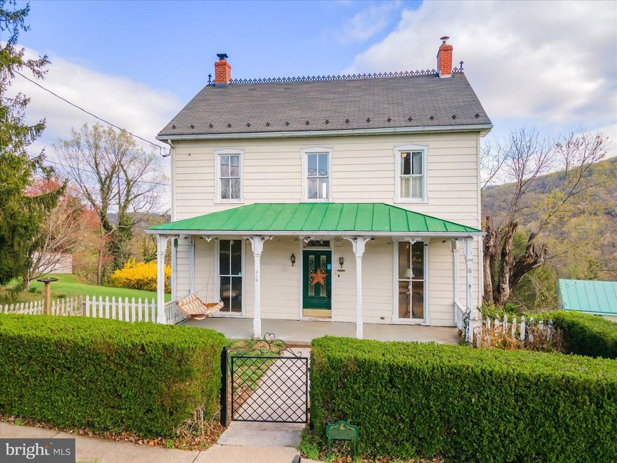 "The scene is worth a voyage across the Atlantic", Thomas Jefferson October 25, 1783.

This monumental location, with its exceptional, protected views is out of the hustle and bustle of the Town of Harpers Ferry.  Surrounded by Harper Cemetary and Harpers Ferry National Park, this property sits on .44 acres, which is unique for an intown property in itself, but the view of Harpers Ferry Gap sets 316 Fillmore Street apart.   The yard lends itself to many options from expanding the existing home to adding porches and patio to take advantage of the truly remarkable viewshed.

Built in 1889, 316 Fillmore Street has been called home to only five families, the longest being 52 years.  This home is ready for a new steward who can breathe new life into this very special property.  The large living room offers breathtaking views from the bay windows.  The stairwell feels like the heart and soul of the home where you can sense days gone by.  The dining room, kitchen and full bath are on the main floor as well.  The second story has three bedrooms, one being a primary, and a full bathroom.  The upper level has two bedrooms with a large closet in between.  The lower level has a large room that lends itself to be a recreation room, a smaller room and the utility room.  The furnace was replaced in 2024.  The chimneys have both been repointed and capped within the past few years.  The stone retaining wall along the driveway was also rebuilt at the same time.  Wake up to the sunrise through the Gap!  316 Fillmore Street is within walking distance to the train station that has service into Washington DC, hiking, biking, canoeing, tubing, fishing...  See the history of 316 Fillmore Street in the documents.
