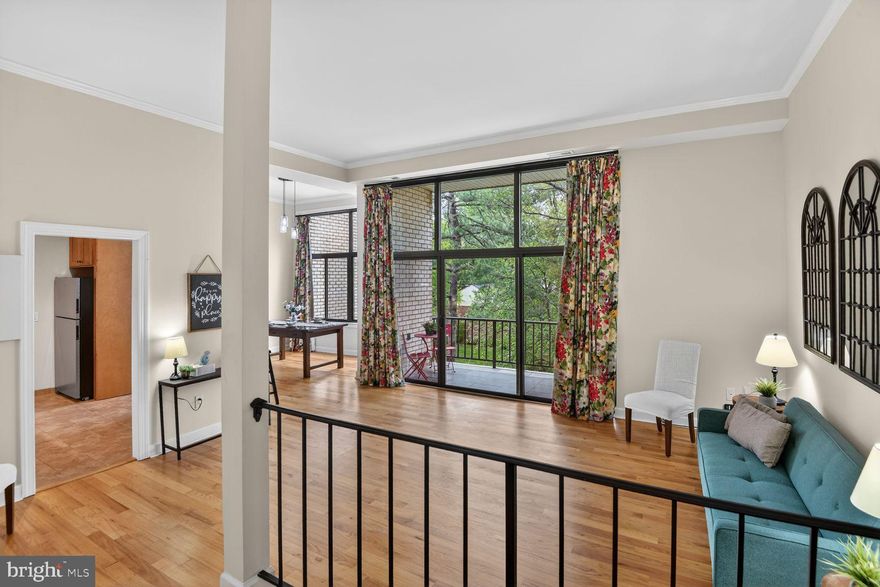 PRIME  central location in the heart of Silver Spring, with quick access to Metro, Shopping, Dining Out, Entertainment, Transportation, Georgia Ave, and 495!  Bright, spacious, and move-in ready—this beautifully updated spacious  2-bedroom, 2-bath condo on the third level offers comfort, style, and convenience. The home features numerous recent upgrades, including brand-new carpeting and ceiling fans in both bedrooms, a new HVAC system (2023), new washer and dryer (2022), stainless steel dishwasher (2022), and a newer stainless-steel refrigerator (2019).   
The updated kitchen shines with granite countertops and a stylish tile backsplash,  and 42" cabinets, perfect for both everyday living and entertaining . Eleven Foot ceilings elevate the expansive living and dining and kitchen areas while floor-to-ceiling windows fill the space with abundant natural light.   Step outside to a tiled  private balcony—ideal for relaxing or creating your own cozy garden retreat. The entire interior has been freshly repainted within the past two years, giving the home a clean, modern feel throughout.    Enjoy easy access to community amenities, including a recently renovated pool just across the courtyard and a fitness center with updated equipment. This well-maintained condo is truly turnkey and ready for you to call home.  Aprox.  3 blocks to Wheaton Metro for ease, plus 1 assigned parking spot and one unreserved spot.