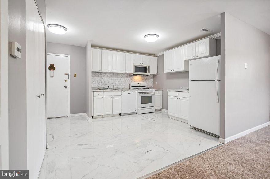 Spacious 3 bedroom 2 full bath unit in the residential neighborhood of Thomas Choice Gardens.  Newly updated unit with open concept design in common area.  Bathrooms and kitchen renovated with modern features. Washer/Dryer within unit.  All utilities included.  Open parking lot right in front of building. Easy access to I-270 exit 11.  Move-in ready! Be sure to check out the virtual tour!