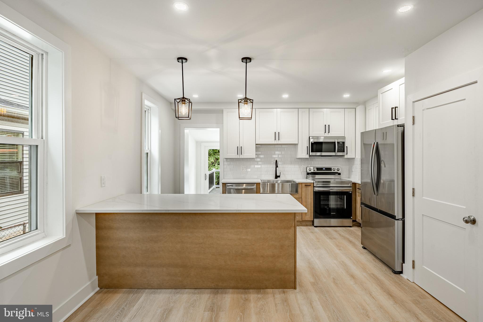 Be the first to live in this newly renovated 4-bedroom, 4-bathroom home in highly desirable West Conshohocken. This 1,900 sq ft home features exposed brick, contemporary lighting, all-new windows, and a brand-new kitchen. The open-concept main level flows from the spacious living and dining areas to a Trex deck overlooking a large, fenced backyard, perfect for entertaining or relaxing.
Upstairs, you'll find two bedrooms and two full baths, including a junior suite with dual closets and a designer en-suite. The sun-filled third-floor primary suite offers space for a home office, generous storage, and separate climate control. The fully finished basement adds even more versatility with a full bath, closet, walk-out access, and extra storage.
Additional upgrades include new plumbing, electrical, HVAC, and two mini-splits. New washer/dryer.