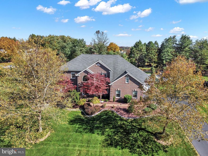 Stunning Home in the desirable community of Pinehurst.  Wonderfully maintained and Elegantly appointed,  this home offers a total of 5 spacious bedrooms - which includes the sumptuous primary suite with gorgeous vaulted ceiling, en-suite bathroom and two huge walk-in closets (his/hers), 3 additional, generously sized bedrooms on the 2nd floor, 1 office/bedroom/den on the 1st floor w/attached full bath and closet (perfect for guests or an in-law suite).  The first floor boasts gleaming hardwood flooring, an impressive 2-story foyer with an inviting formal dining room with a tray ceiling, a cozy family room with a unique ceiling, gas fireplace, lovely windows and a bar area for entertaining.  The gourmet kitchen features tile floors, granite tops, a sizable island, and upgraded stainless steel appliances - which includes a double oven.  From the kitchen you can move right into the charming sunroom with a skylight for amazing light and sliding doors that lead to the patio/pool area.   Finishing off the first floor is a convenient laundry room with plenty of counter space for folding with a sink and "drop zone".  The lower level of this home is fully finished and provides exceptional space for entertaining family and friends with a family room, wet bar, game room, and a den/flex space with a full bath.  The outside of this home is equally as gorgeous as the inside, with a heated, saltwater inground 22' X 42' pool and attached hot tub, a patio on which to relax and watch the stunning sunsets & sunrises, and beautiful, well manicured landscaping.   Also worth mentioning is the central-vacuum system, tank-less hot water, water softener system,  security system,  and the oversized 3-car garage with extra storage and durable epoxy floors.  Close to all area amenities - fine dining, premier medical facilities, major roadways and so much more.  You need to visit this exquisite home so you can see all of the impressive details for yourself.