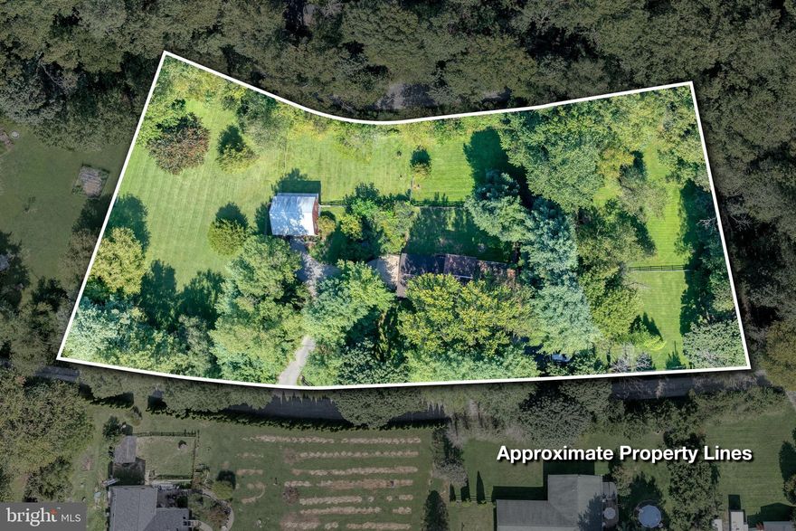 Welcome Home! Located in a gorgeous and private bucolic southern York setting your new home awaits! Bring your horses, ATV's or whatever toys make you smile.. 2.34 acres including a huge barn/additional 2/3 car garage, bank barn w/ 3 stalls and tack room w electric and water. Enjoy your amazing outdoor space  from the wrap around deck or patios. This 2 story colonial boasting recent updates including fresh paint and flooring, kitchen and bath updates. This open floor plan has cathedral ceilings in the living room, kitchen, & dining room, very spacious bedrooms with tons of closet space, a huge finished walk out lower level rec room w/ a wood or coal stove, an additional bedroom or office. Also includes a large attached 2 car garage w/mechanics pit. Move in ready!!!