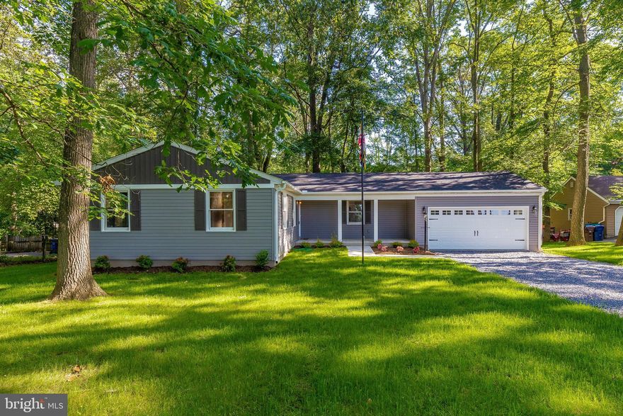 Welcome Home to serenity now . That is what you will feel as you walk through the totally newly remodeled 3 bedroom 2 full bath home by Cumberland INC. You will continue to get that feeling every month with the new super efficient energy saving heating and cooling system allowing you to perfectly balance the open living space. The all new LED lighting on the exterior and interior have the savings continue to put a smile on your face. The hand crafted custom wood island (3x8) will be the center piece to your entertaining while also offering function to the all new kitchen. The 2 level deck allows you to relax and enjoy the spacious  backyard. CUMBERLAND did it again with his quality remodel sparing no expense. New 30 year roof, NEW siding and gutters, NEW flooring, NEW Cabinets and counter tops, NEW plumbing and fixtures, and all NEW mechanical.  Don t miss your chance at this highly efficient home.