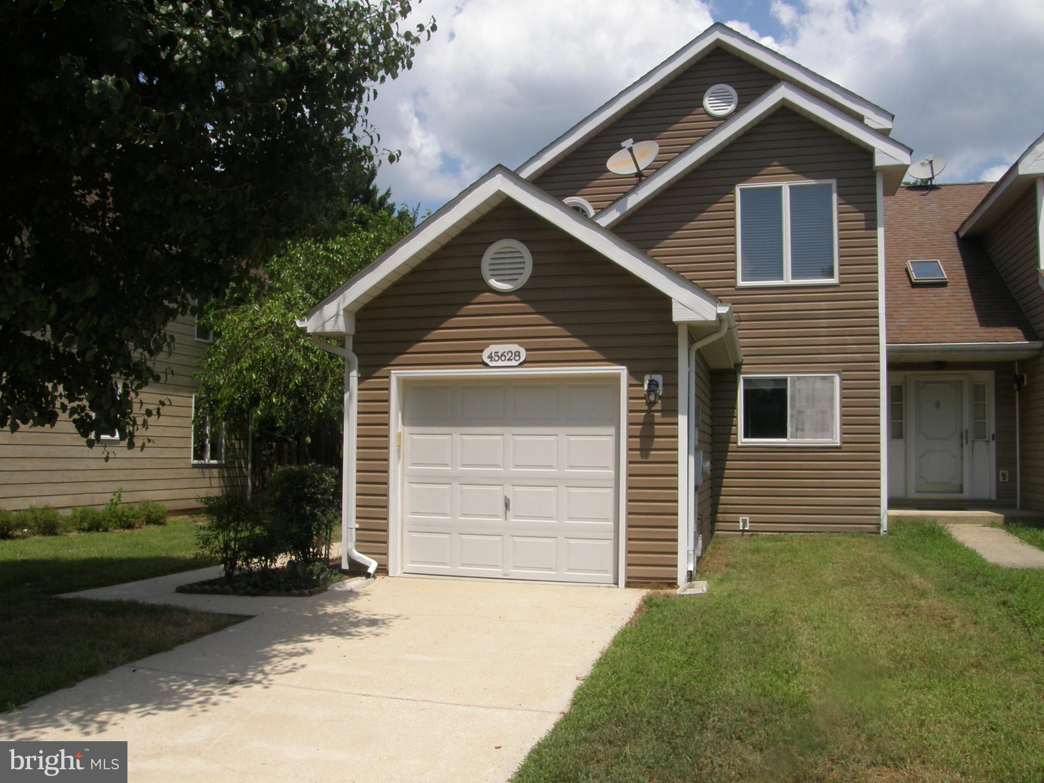 Exceptionally nice end unit Townhouse that has been updated and ready for move in. New Quart Kitchen Counter with new appliances; range with air fryer, garbage disposal, and new frig with water/ice; built-in microwave. Washer and dryer are available (working but as is), wood burning fireplace in living room, one car garage with new quiet opener and direct access to main level, sliding door from main level to outside patio courtyard with privacy fence and outside entrance., main entrance with covered landing, Full basement with recreation room with outside exit (could be guest sleeping), and large utility are with loads of storage, newer Heating/Ac unit and water heater. 2nd floor has two spacious master suits with separate full bathrooms, lots of storage with one having walk-in and other having separate closet storage. New chair height toilets and new vanities and tops throughout. Nice 28-unit townhome community in great location surrounded by fine homes. Extra parking for each unit. Lots to offer-garage, basement, storage, courtyard, end unit with energy efficent appliance and utilities in small convenient community.