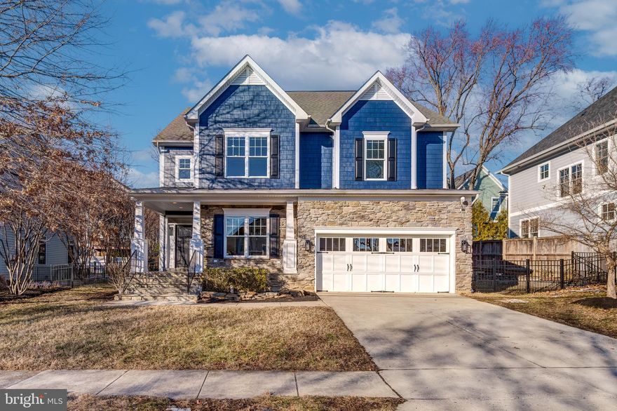 Discover the epitome of modern living in this beautifully reimagined home, perfectly situated in a tranquil and scenic neighborhood. Featuring six bedrooms and four and a half bathrooms across nearly 4,500 square feet, this remarkable residence seamlessly blends serenity with unmatched convenience. Located just minutes from Washington, DC, and within a highly sought-after, top-rated school district, it offers the ideal combination of comfort, luxury, and accessibility.

The main level features elegant formal dining room, a home office, a cozy family room with a gas fireplace, and a gourmet kitchen with an adjoining breakfast room that opens to the backyard. At the center of the home is a breathtaking gourmet kitchen—a chef's dream—expertly crafted to spark creativity and enhance everyday living with its high-end finishes and meticulous design. This four-level home also includes a partially finished basement with a rough-in bath, offering endless potential to customize and bring your vision to life.

The upper level is a haven of comfort, featuring four elegantly appointed bedrooms, including the expansive and luxurious primary suite. Designed as a private sanctuary, the suite boasts sophistication and tranquility. For even greater flexibility, the loft level provides a spacious sixth bedroom, a full bath, and an additional living room, ideal for accommodating guests or crafting a secluded retreat.

The outdoor living space is just as impressive, featuring a beautifully transformed backyard designed for both relaxation and entertaining. A retaining wall and a modern paver patio with two adjoining areas create plenty of space for dining, complemented by a convenient serving and storage unit. A cozy seating area invites you to unwind and enjoy the outdoors. The fully fenced backyard includes a contemporary wooden fence at the rear and a stylish aluminum fence with a gate, adding both aesthetic appeal and functionality. Timeless solid brass lighting enhances safety while providing warm illumination, and the charming covered front porch offers a cozy retreat to relax and take in the peaceful surroundings.

This home effortlessly blends style, comfort, and practicality, offering everything you need for a refined yet functional lifestyle. It’s the perfect place to create lasting memories.