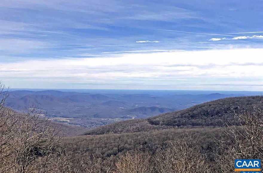This exceptional homesite at Wintergreen offers rare, unobstructed year-round views of the Rockfish Valley, the Blue Ridge Mountains, and breathtaking sunrises. With an eastern orientation and a backdrop of hundreds of acres of protected open space, the setting is remarkably private, peaceful, and serene. Located near the end of a quiet street lined with high-end homes, this property provides the perfect blend of seclusion and convenience. Vacant view lots of this caliber are increasingly scarce at Wintergreen, as most premier sites have already been built on. The parcel is fully served by all key utilities?electric, public water and sewer, and fiber-optic internet?making the building process straightforward. Enjoy easy access to nearby hiking trails and a short drive to the Devils Knob facilities, including golf, racket sports, and a fine-dining restaurant. A truly rare offering and an ideal canvas for your future mountain home.