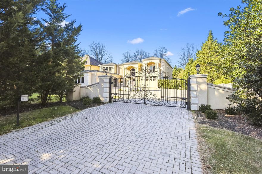 Custom built masterpiece on a privately gated lot with a marble fountain at the entrance that is just steps away from Potomac Village. Features Egyptian marble, Brazilian cherry wood floors & is approximately 11,000 sq ft. Main level owner suite with his/her full marble BA & 2nd owner suite on upper level. Walkout lower level with wine cellar, sauna and theatre. Home includes top-of-the-line equipment, four gas fireplaces & rec room. Privately gated yard with terrace, patio & 3 car garage. Home has a large clean/usable yard, great for entertaining.