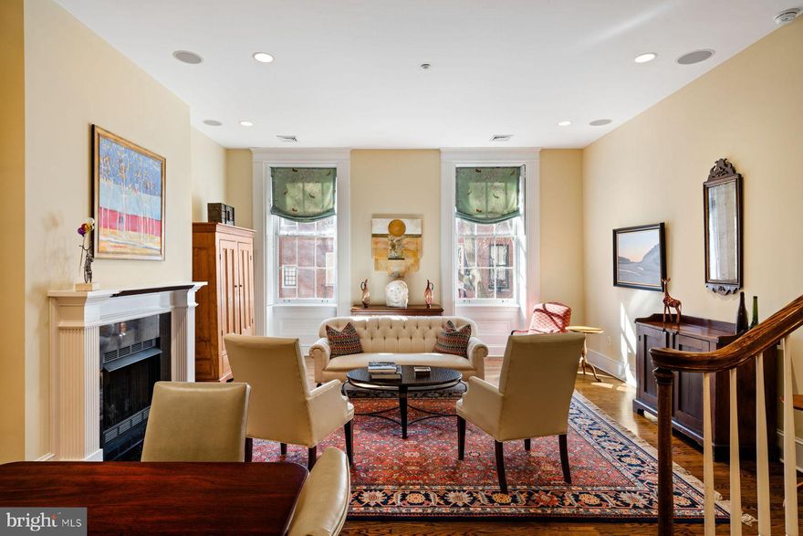 Nothing compares to getting even more than expected at 915 Clinton Street #203. Explore living on the picturesque, tree-lined at Cole House in this 3 Bed, 3.1 Bath condo. Boasting the grandeur of a historic townhome paired with the convenience of condominium living, this residence is a rare gem. As you approach the classic red brick facade and white marble steps, you're welcomed into a well-appointed lobby with secured entry access. Alternatively, access the unit from the rear of the building, mere steps from your included parking space.

Upon reaching the unit via elevator, enter the unit through its foyer. The expansive living/dining area welcomes you with abundant natural light, hardwood floors, and a gas fireplace. The chef's kitchen boasts stainless steel appliances, custom cabinetry, and an inviting island for casual dining.

The guest floor host two spacious bedrooms each with its own ensuite bath and generous closet space. A convenient laundry room adds practicality to this level. Ascend to the top floor to find a luxurious main suite featuring a sitting area, an oversized bathroom with a walk-in shower and jacuzzi tub, and ample storage.

Cole House offers additional amenities including a mail/package room, bicycle storage, and basement storage. Enjoy easy access to all Philadelphia has to offer from Historic Clinton Street.