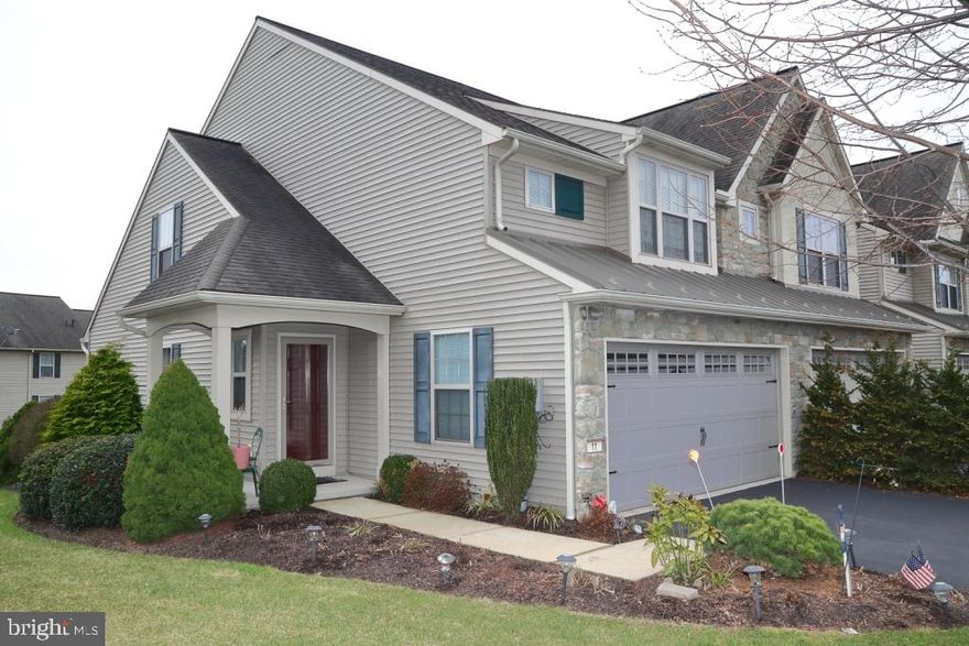 Conveniently located just minutes from Route 222 and the PA Turnpike, this Garman-built, end-unit townhome in the Brookview North community offers all the comfort and convenience that a busy lifestyle demands.  Upgrades throughout the home include premium laminate flooring, rounded radius wall joints, and pocket doors; natural gas fueled fireplace with stone surround in the living room, eat-in kitchen with HD laminate countertops, decorative backsplash, island with seating, natural gas cooking, sliding door access to 10 x 12 composite deck overlooking common area.    Upstairs you'll find the master bedroom with walk in closet and private master bath with whirlpool jetted tub and stall shower.  This level includes two additional bedrooms, full bath and a convenient laundry space.  The fully refinished lower level includes carpeted family room with convenient built-in refrigerator and generously sized storage closets.  2-car garage has wall hung cabinets and handy deep sink for cleanups. Secure outdoor storage area located beneath the deck.  Homeowners association handles lawn maintenance and snow removal.  This gem won't last long.